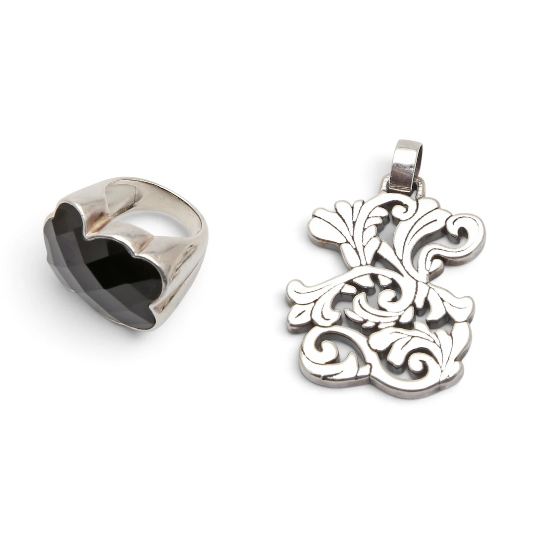 Tous silver and onyx ring and band.