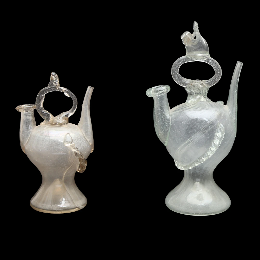 Two Catalan blown glass pitchers, late 18th-first half of the 19th Century.