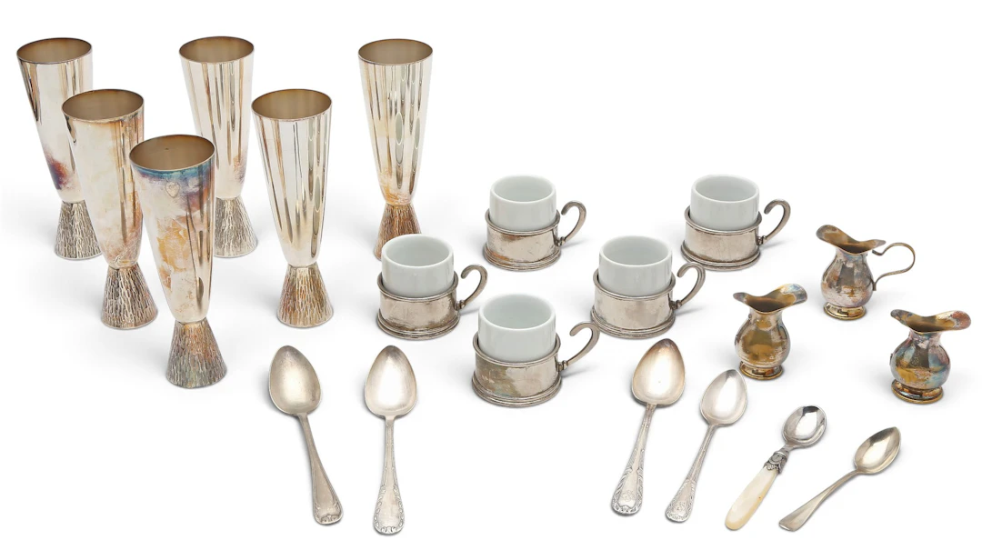 Setof six goblets and various objects in silvery metal, circa 1960.