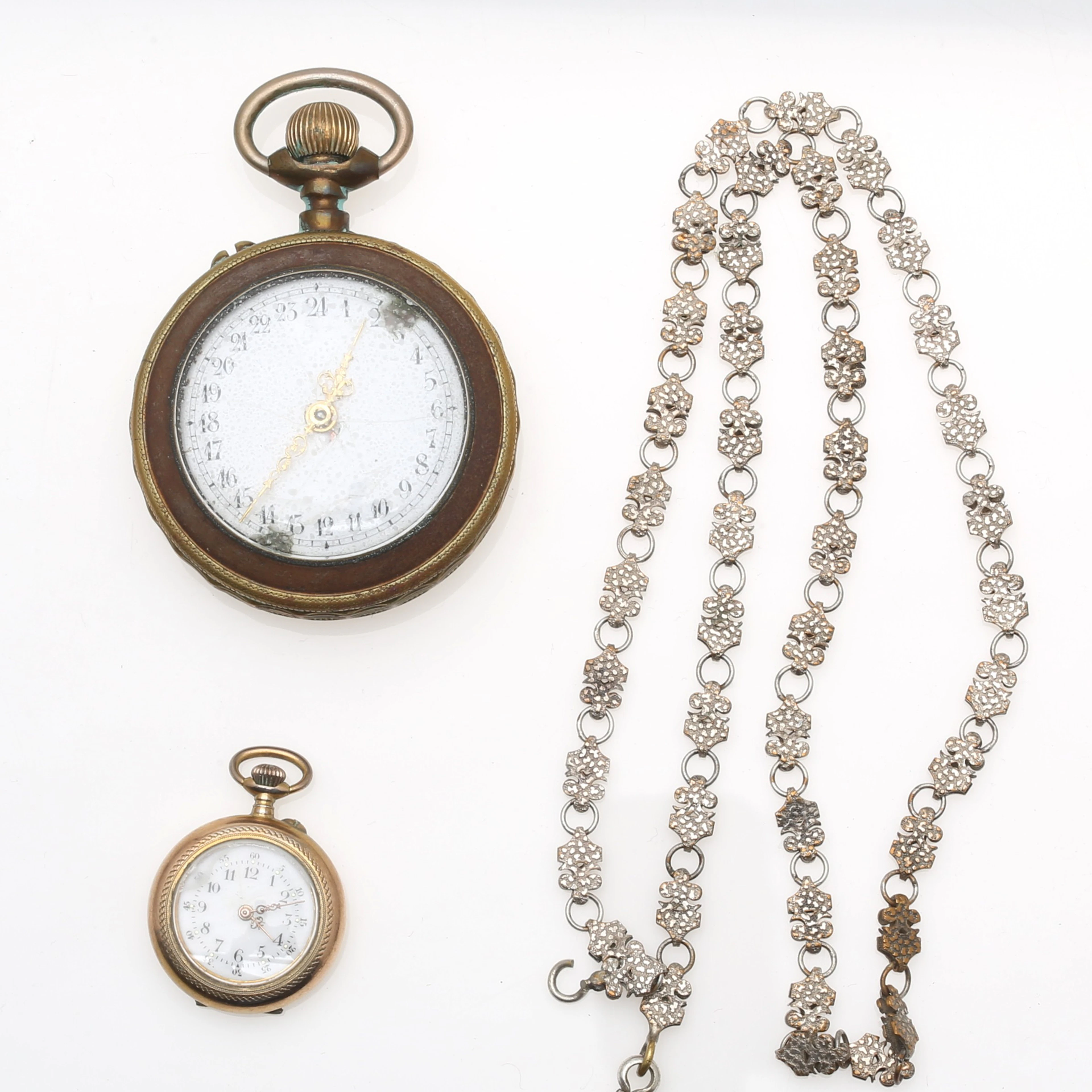 Two pocket watches and chain in silver and metal, second half of the