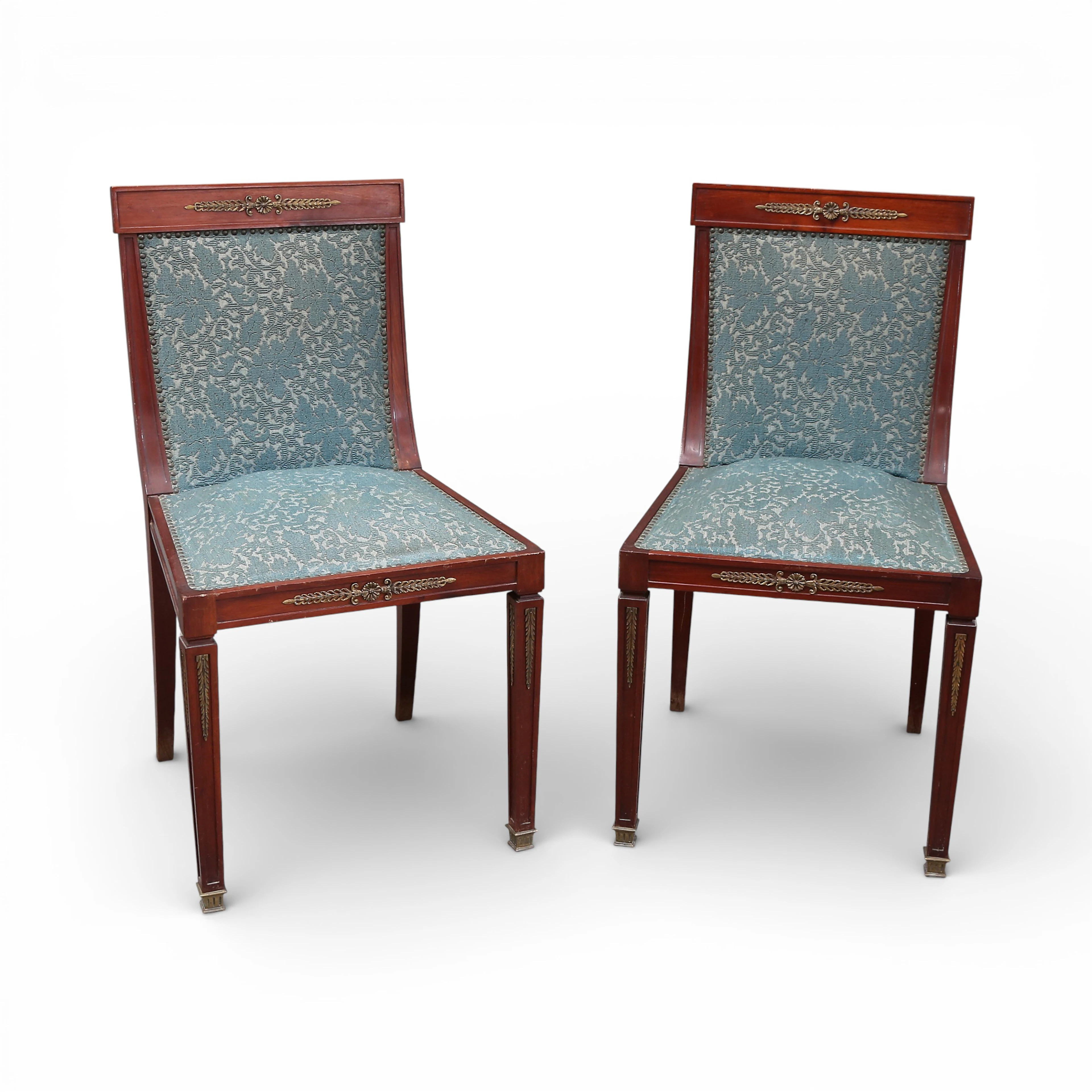 Pair of Empire style chairs in mahogany with bronze applications