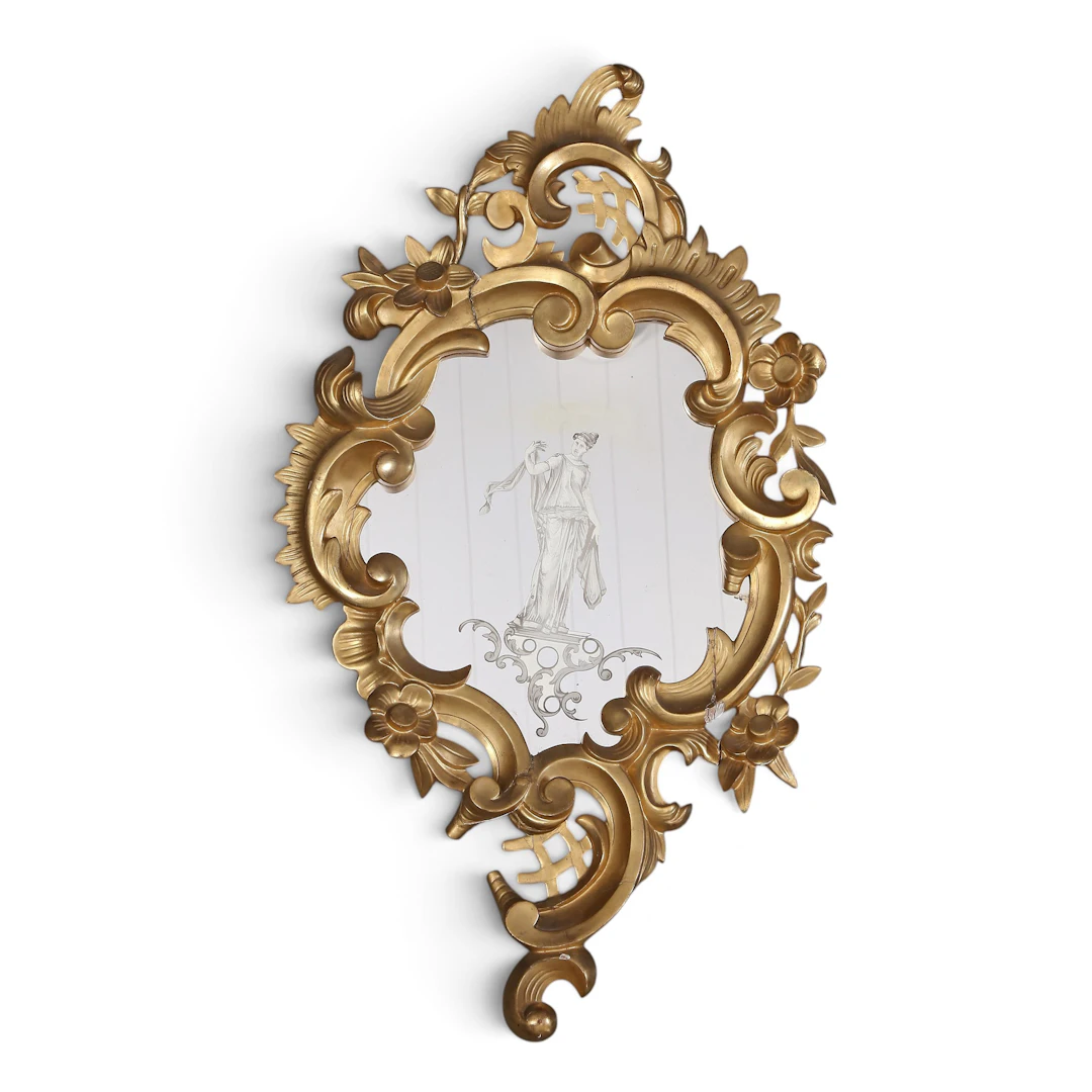Louis XV style ornamental mirror with carved and gilt wood frame, 20th Century.