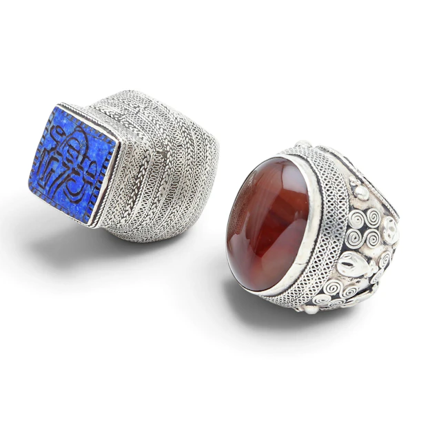 Two large Turkish rings in silver, sodalite and carnelian, late 20th Century.