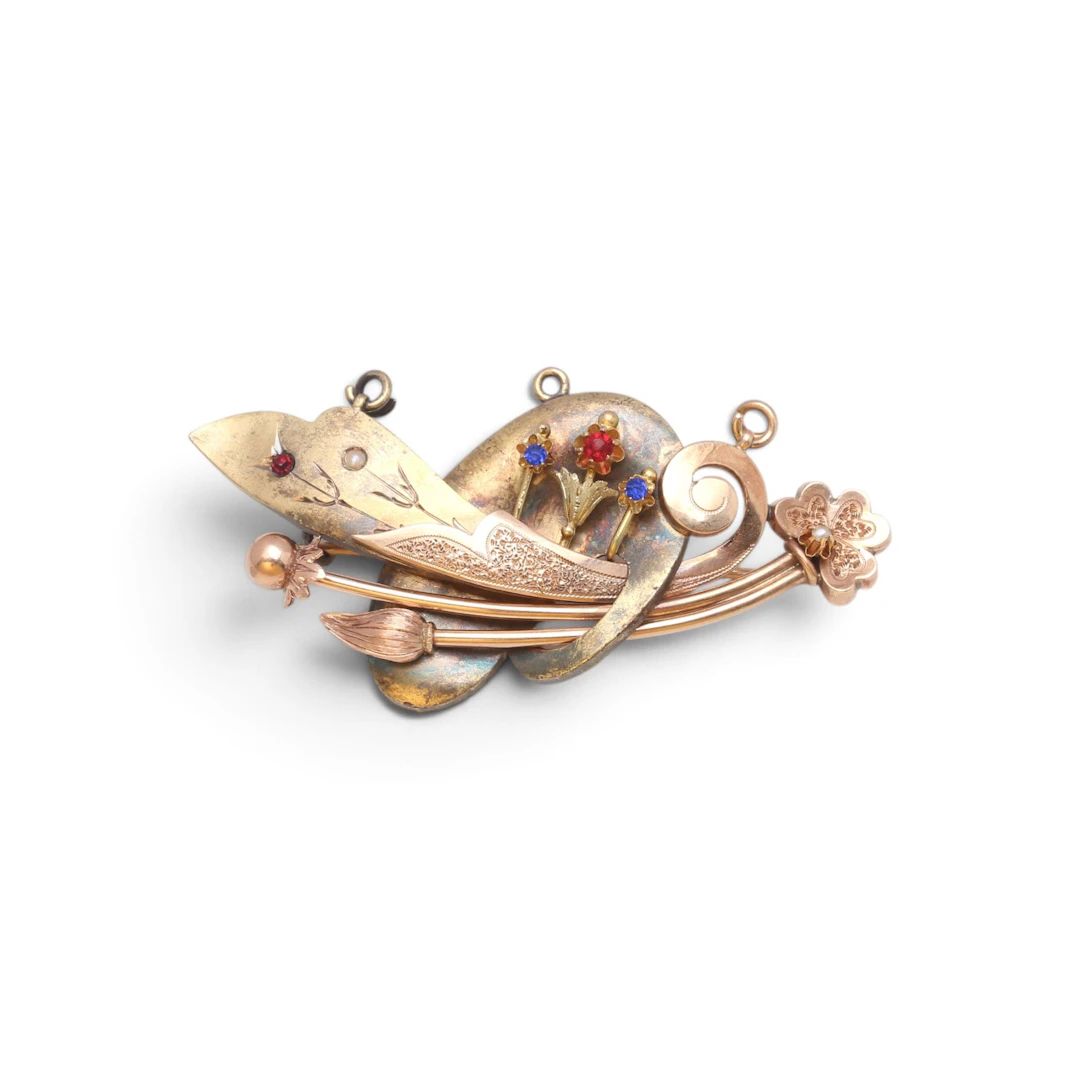 FLORAL brooch-pendant in gold and paste, late 19th century.