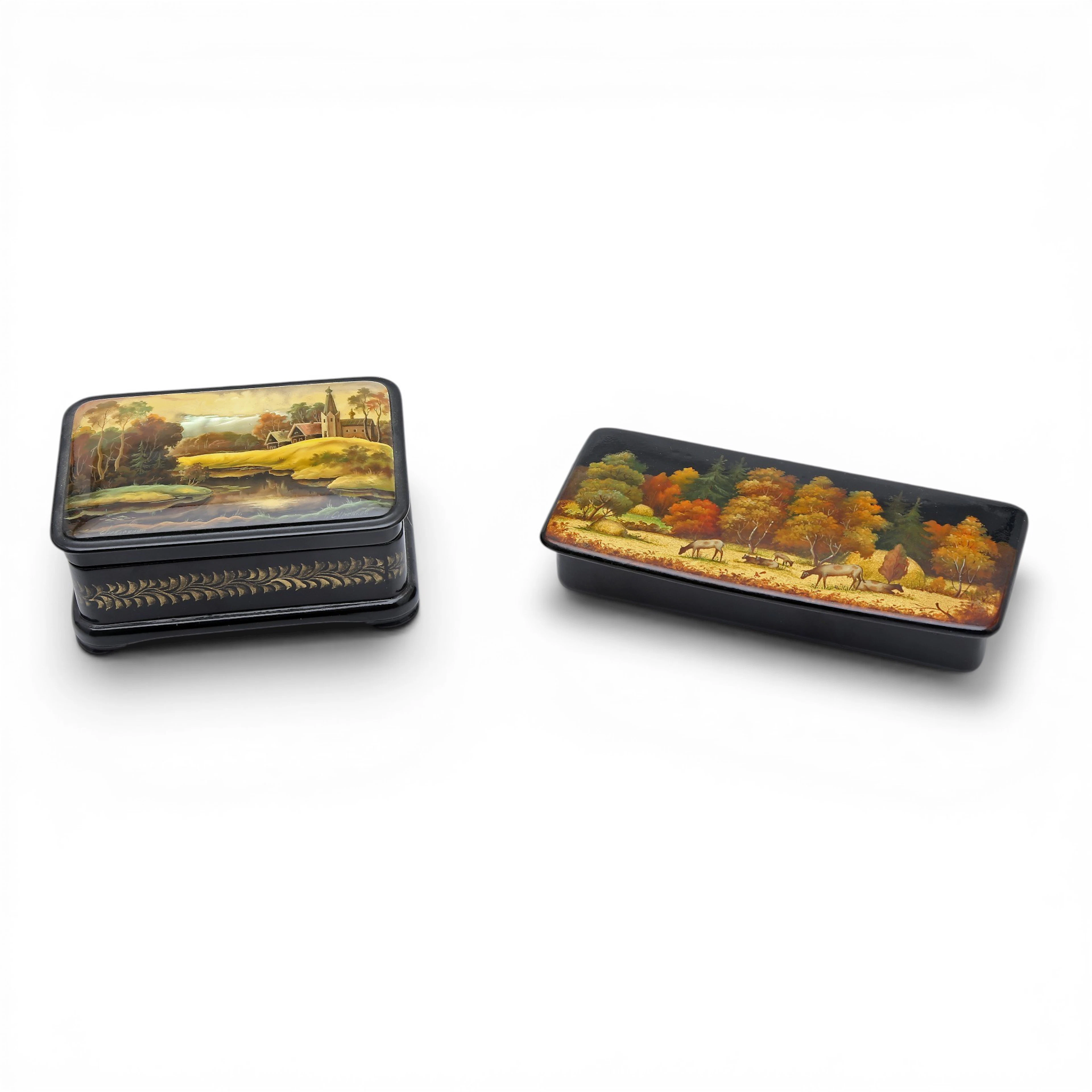Two Russian boxes in lacquered ang gilt papier-mâché, with mother-of-pearl