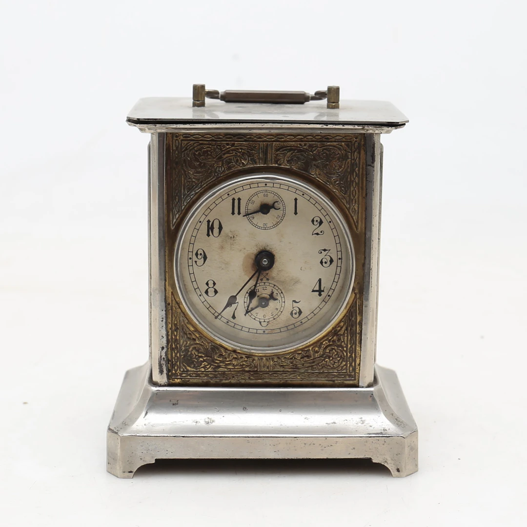 French travel clock in brass, early 20th Century.