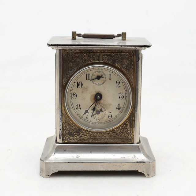 French travel clock in brass, early 20th Century.