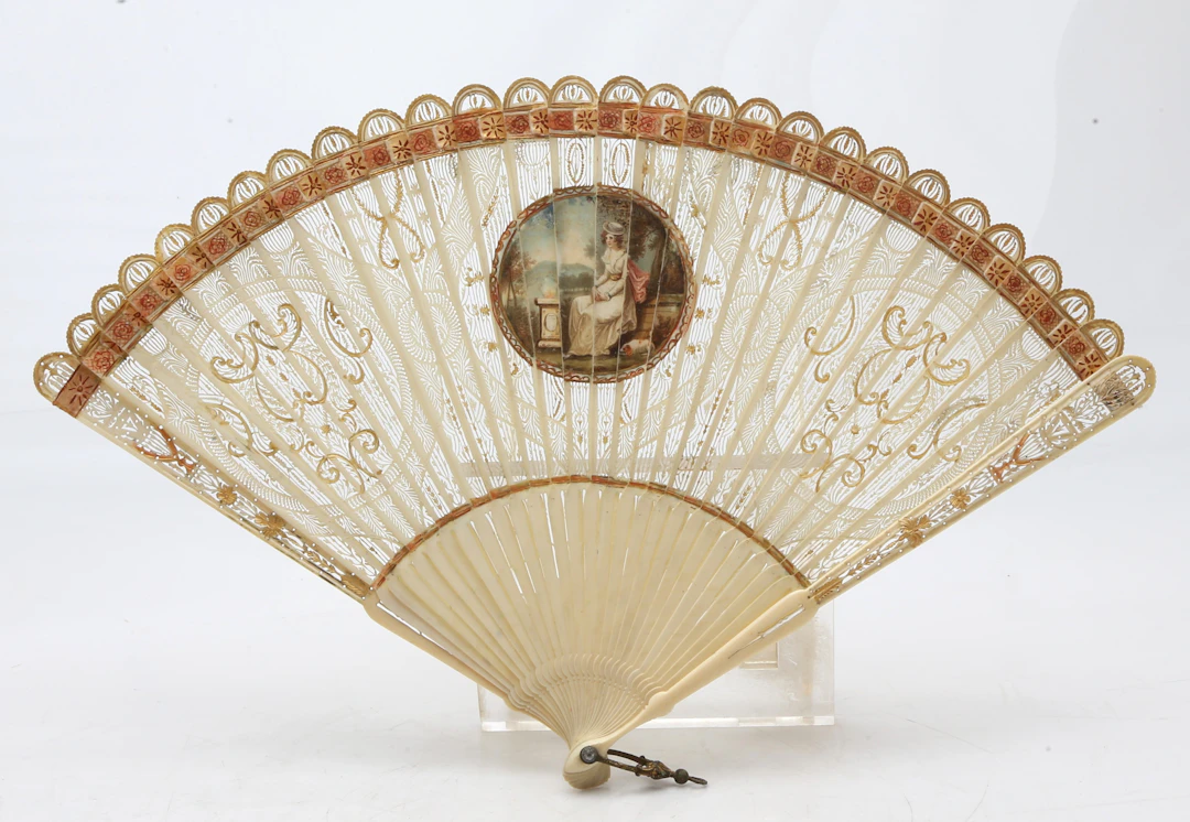 English openwork and gilt folding fan, late 18th Century.