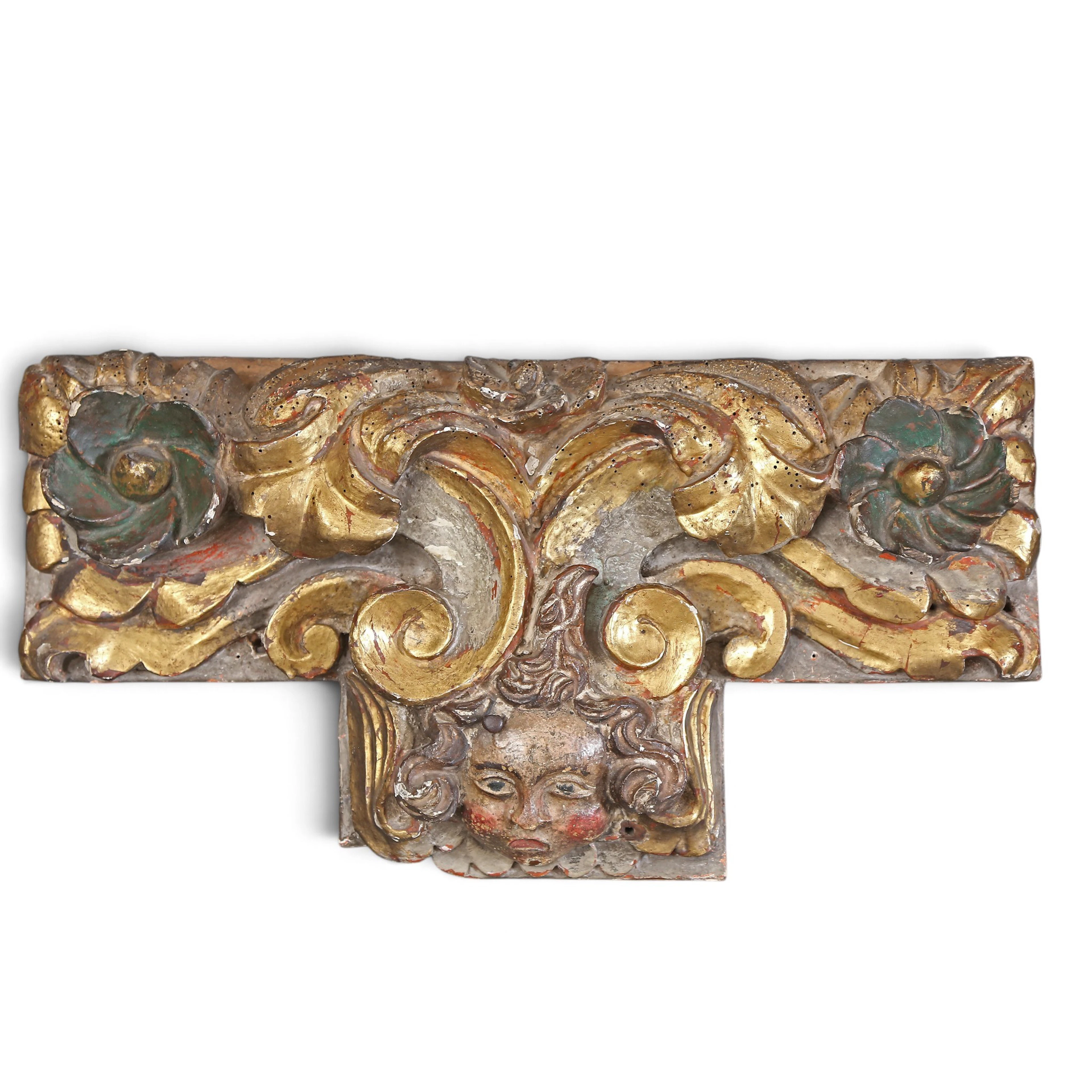 SPANISH SCHOOL, 16TH-17TH CENTURY. Cherub with flowers and foliage.