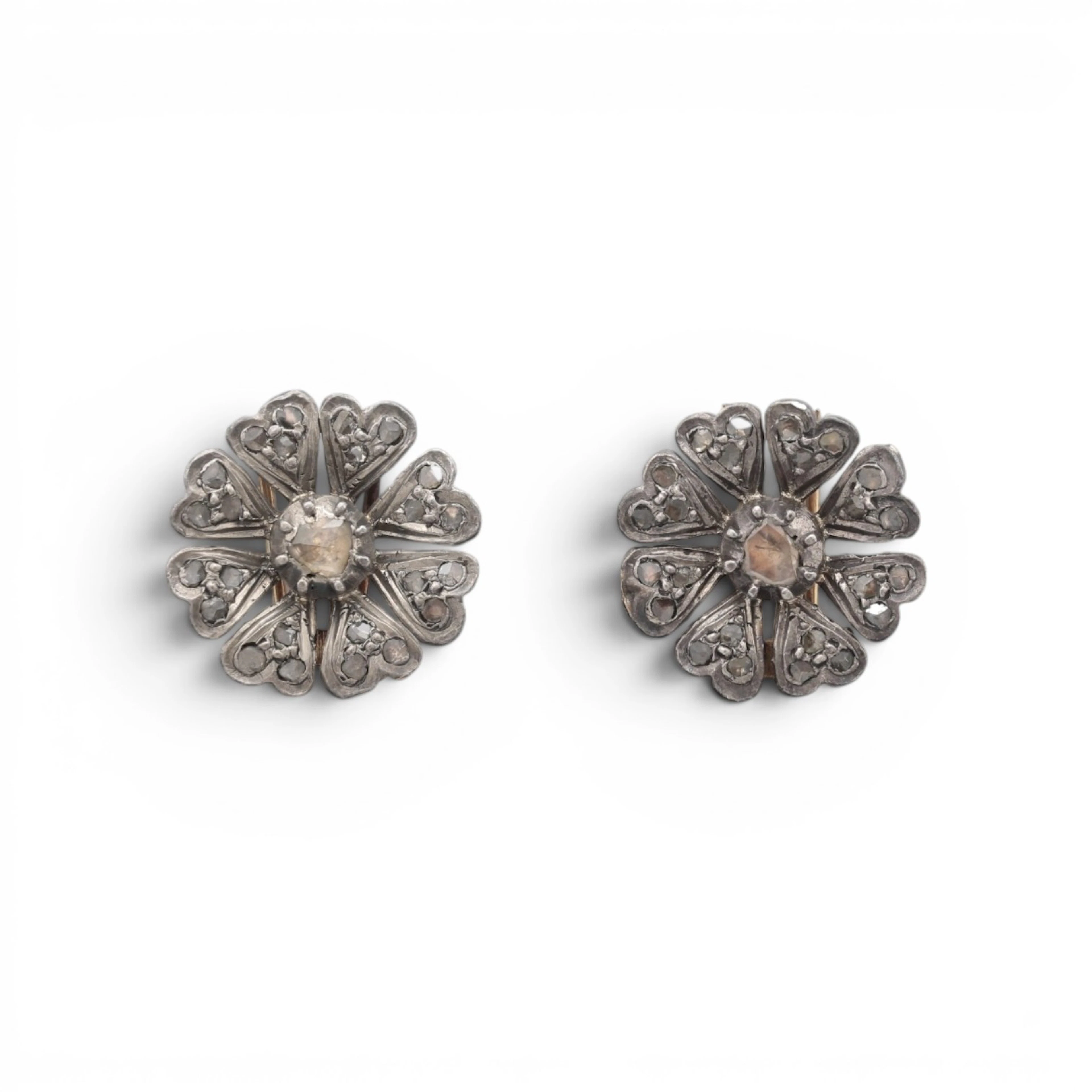 Pair of diamonds floral clip-brooches, late 19th Century.