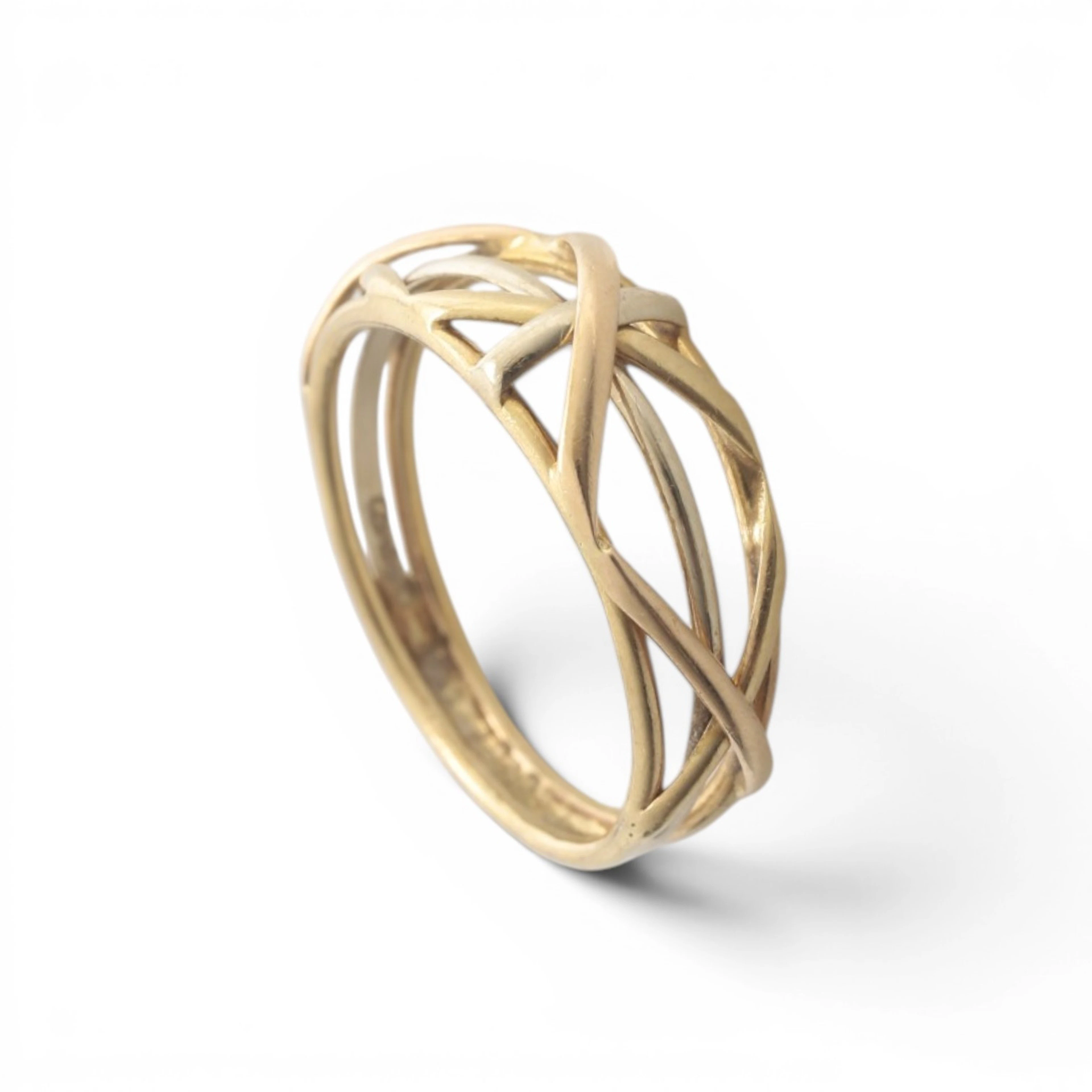 CARTIER. Vintage three-gold ring.