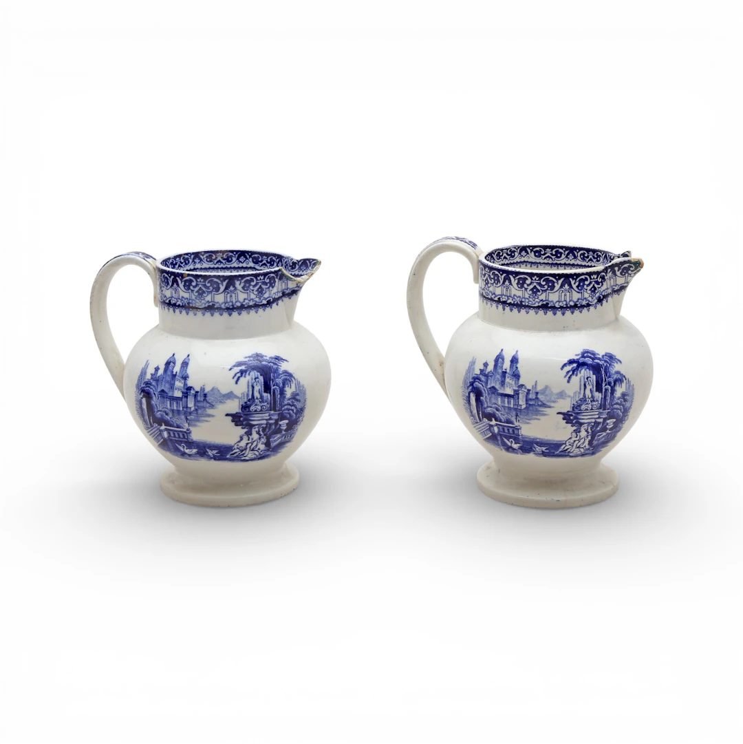 Pair of printed earthenware jugs.