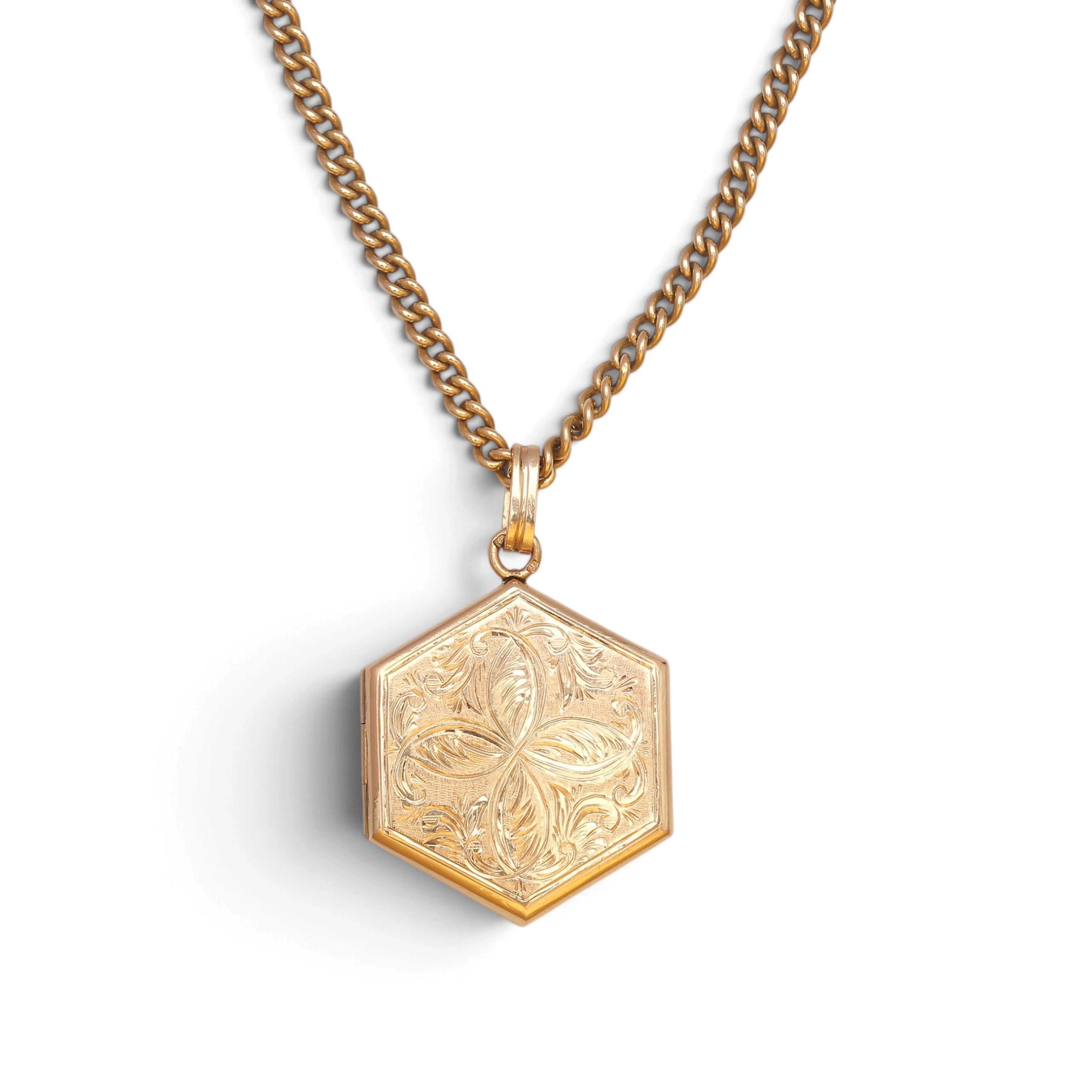 PORTUGUESE 18K gold locket pendant, early 20th century.
