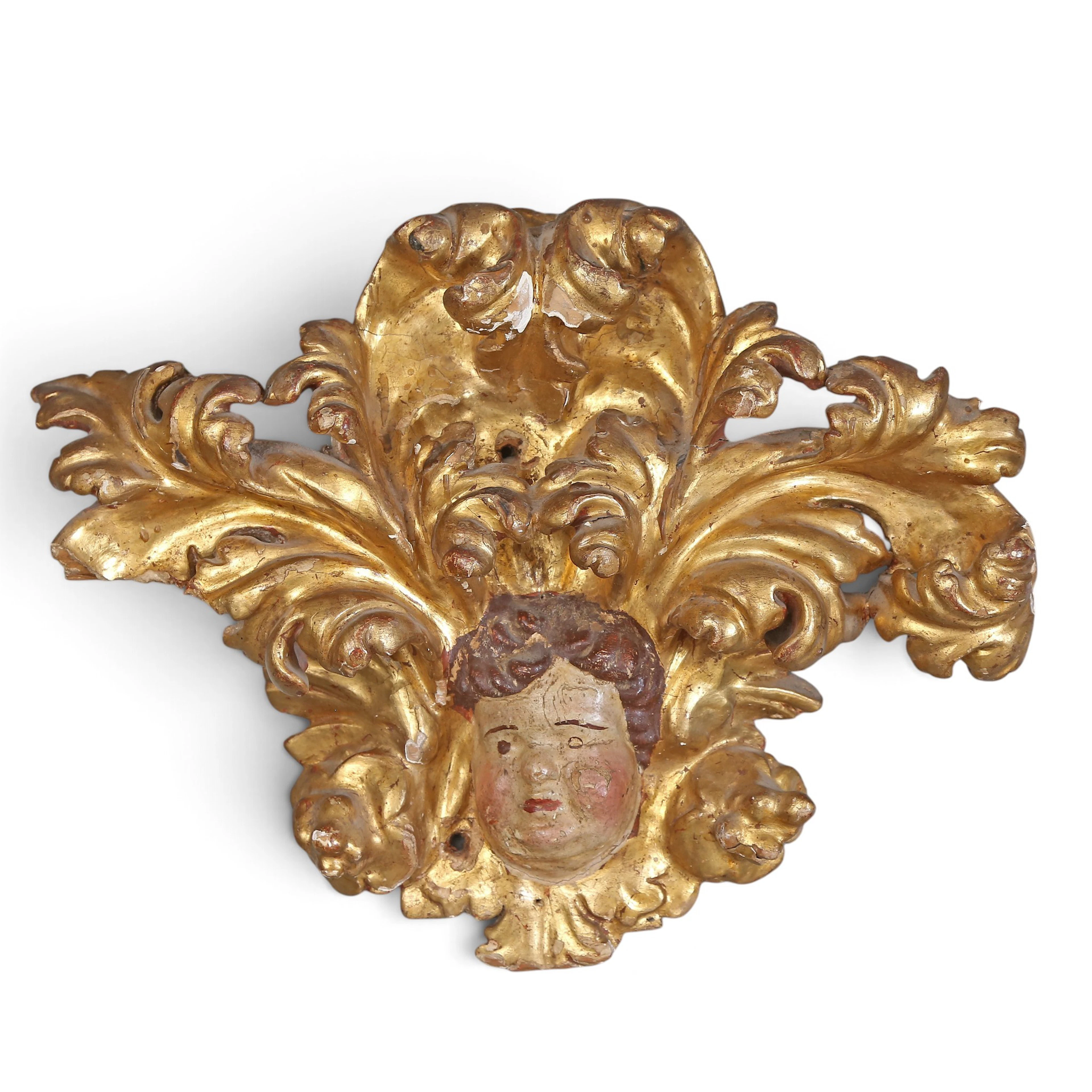 SPANISH SCHOOL, CIRCA 1700. Angel head on foliage.