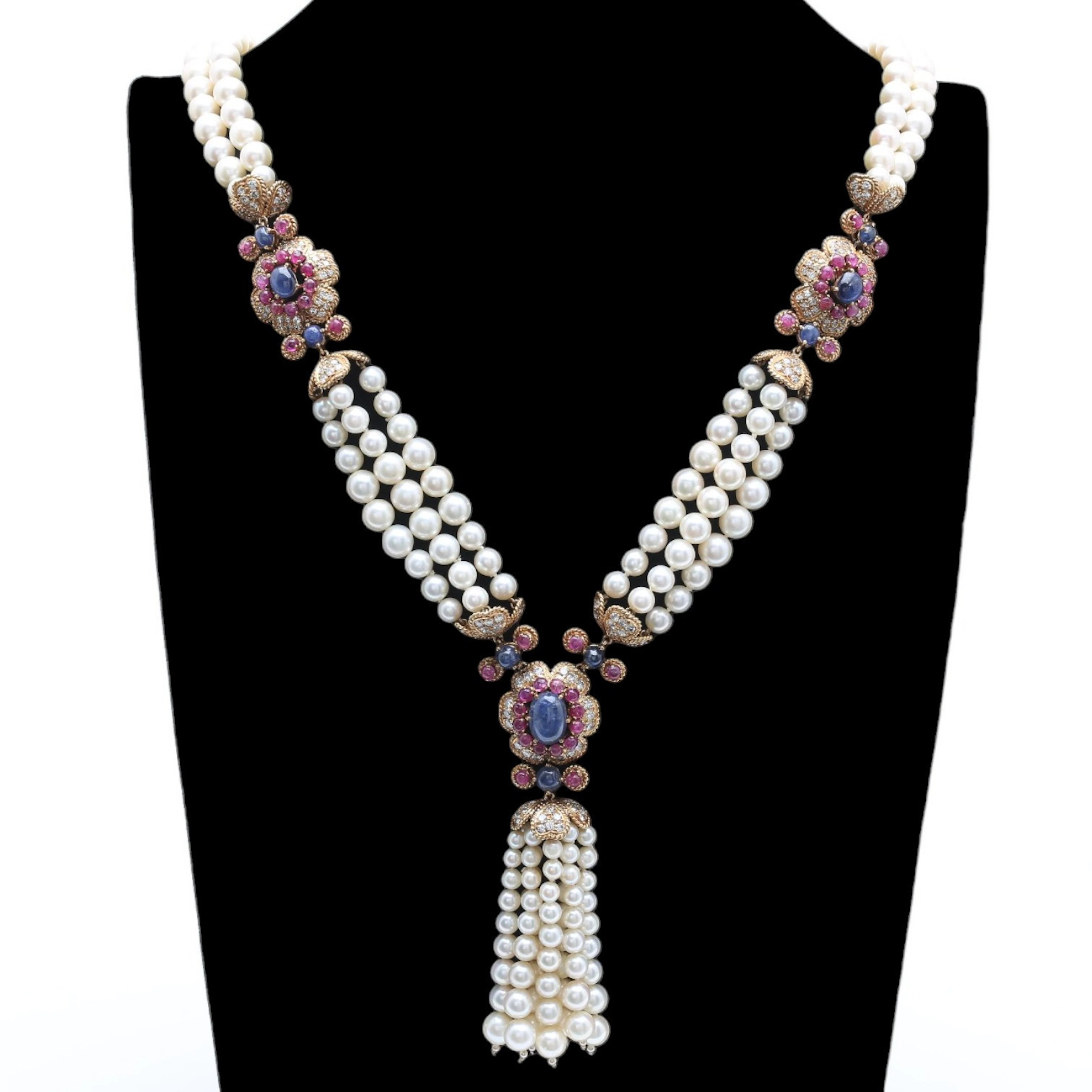 Pearls 'sautoir' necklace with a tassel and sapphires, rubies and diamonds.
