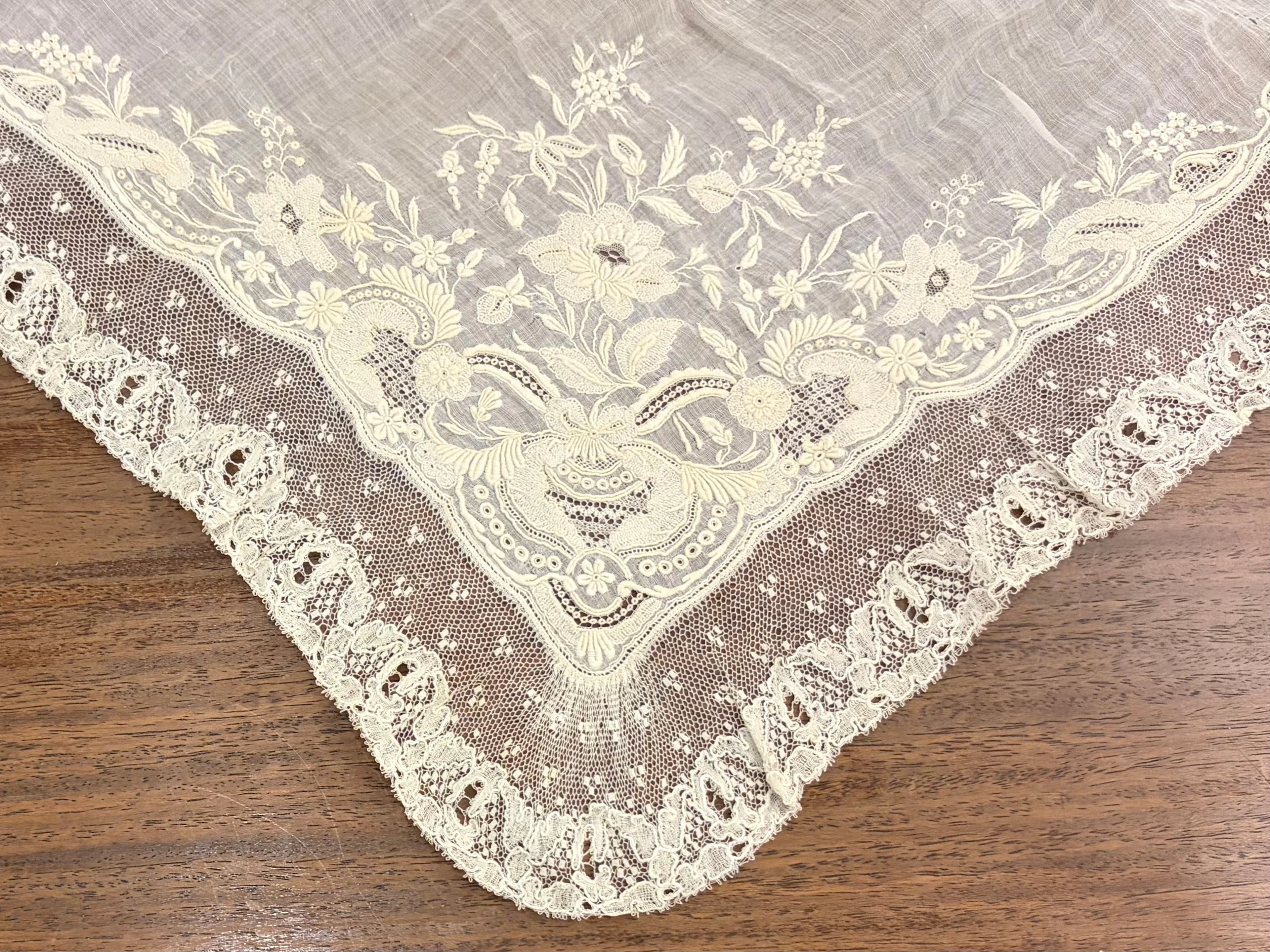 Two embroidered batiste and lace scarves, early decades of the 20th Century.
