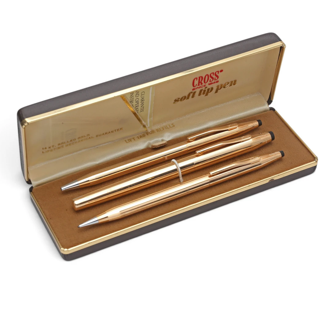 CROSS. Set of mechanical pencil and two gold-plated ballpoint pens.