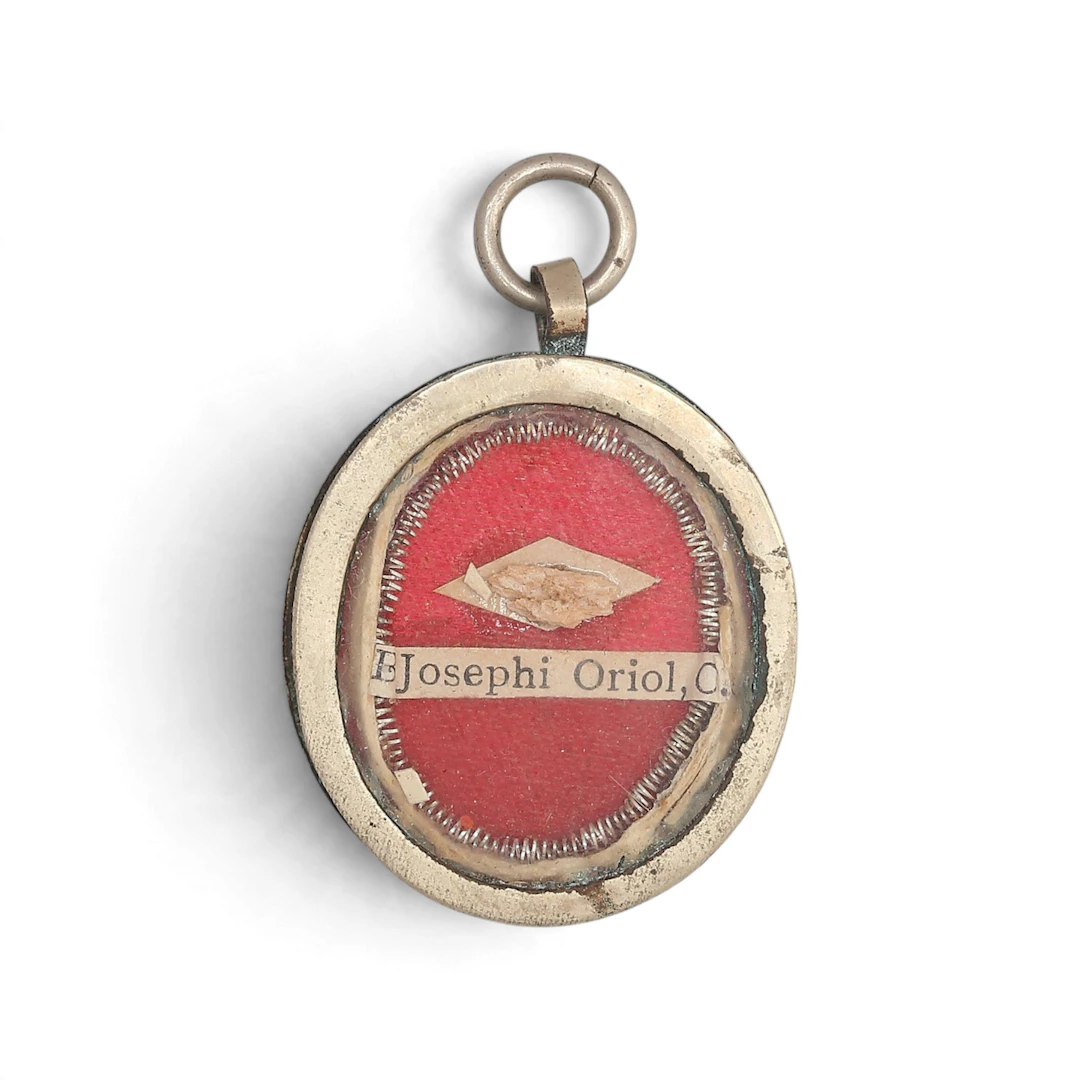 Locket pendant in metal, early 20th Century.