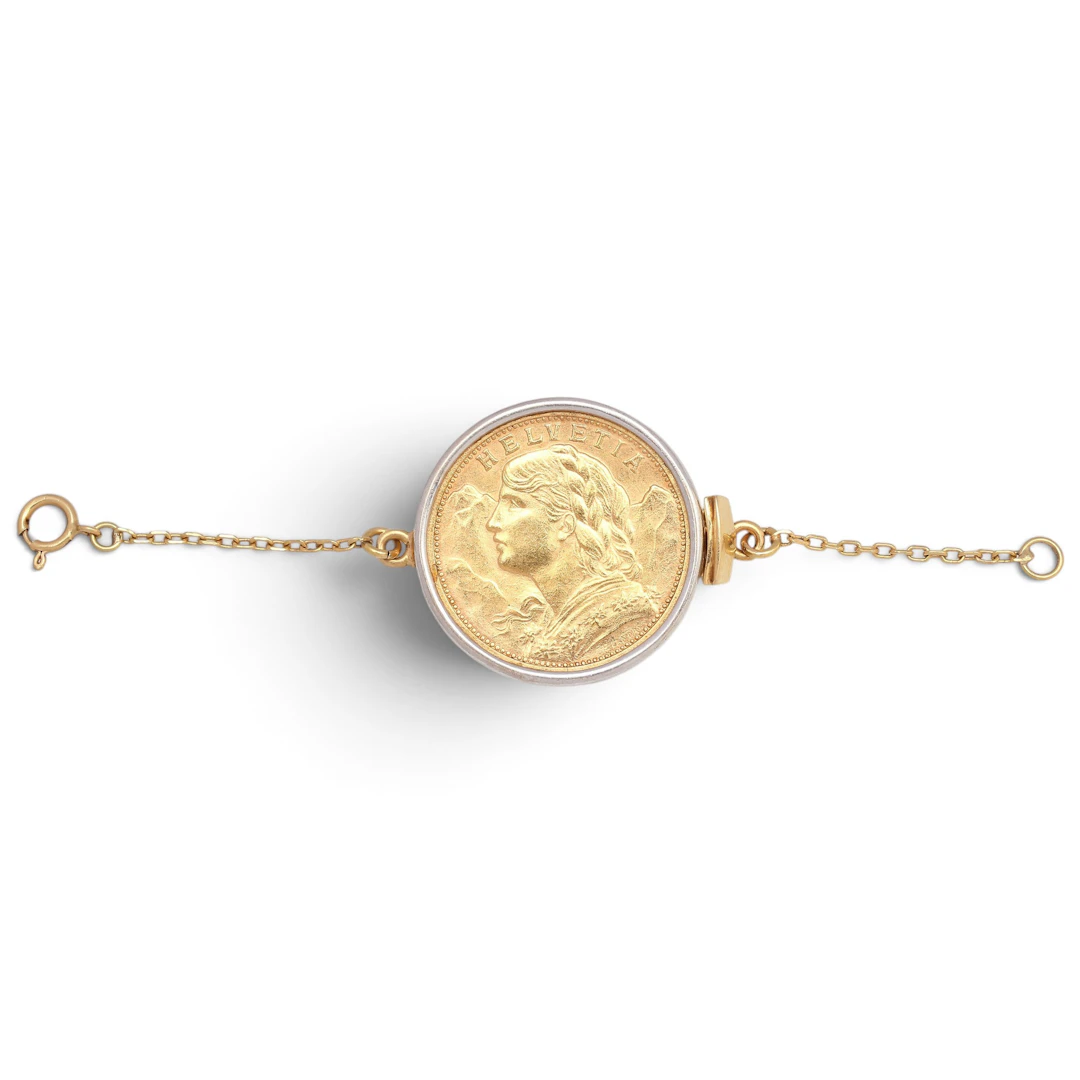 ecklace clasp with a Swiss coin.
