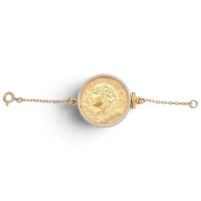 ecklace clasp with a Swiss coin.