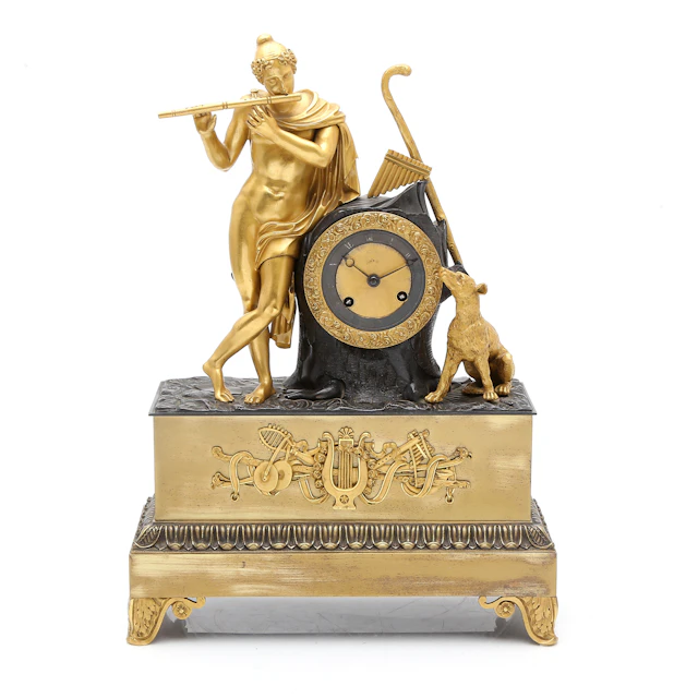 French Napoleon III table clock in gilt and bluing bronze, late 19th Century.