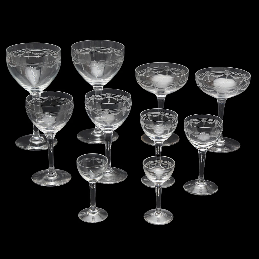 Sixteen-service glassware set in Baccarat "guilloché" crystal, late