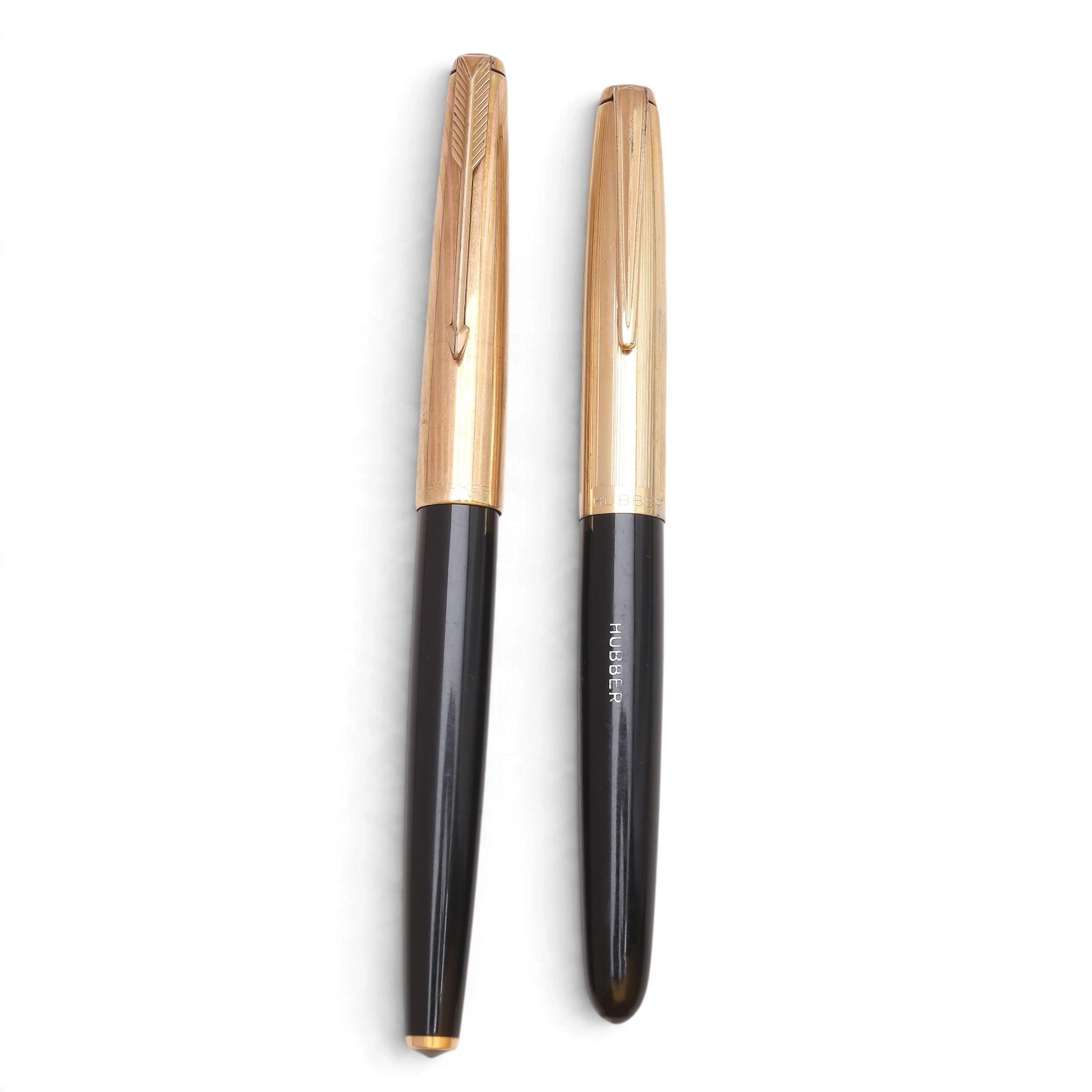 Two fountain pens, Parker and Hubber.