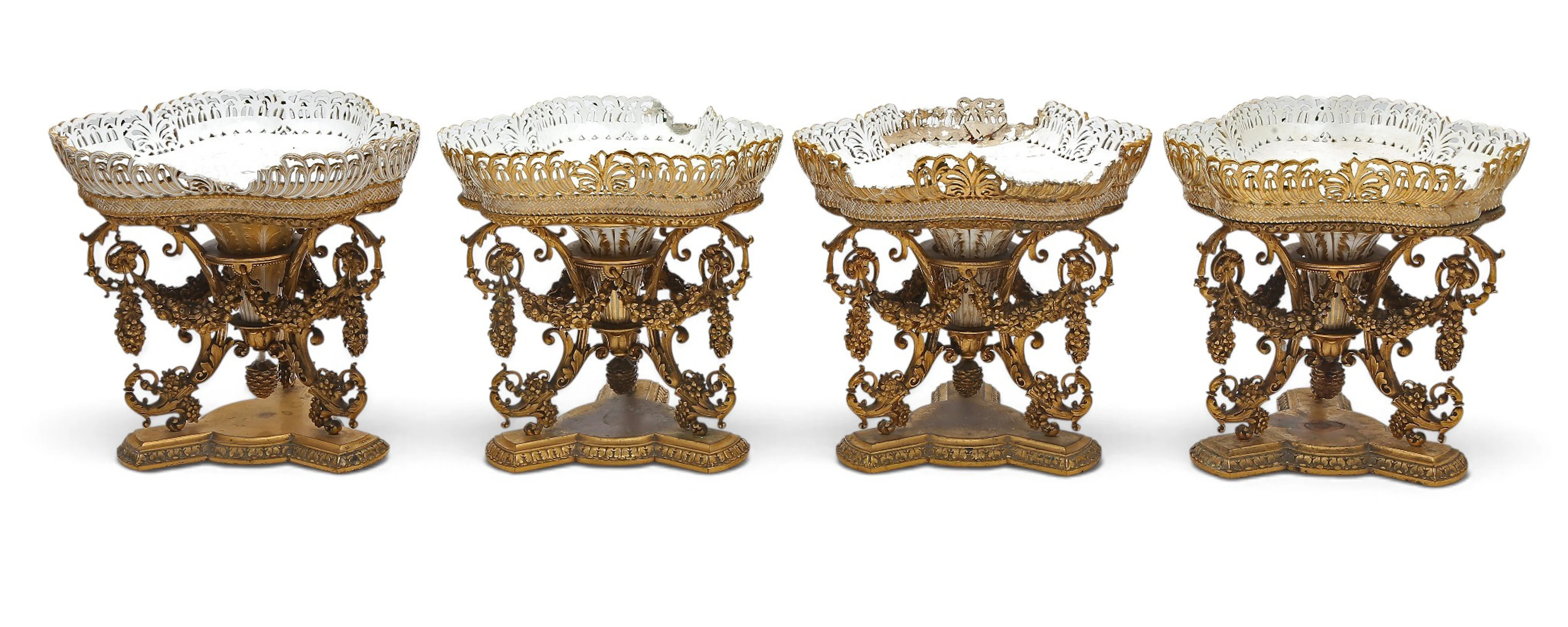 Set of four Napoleon III centerpieces in gilt bronze and porcelain.