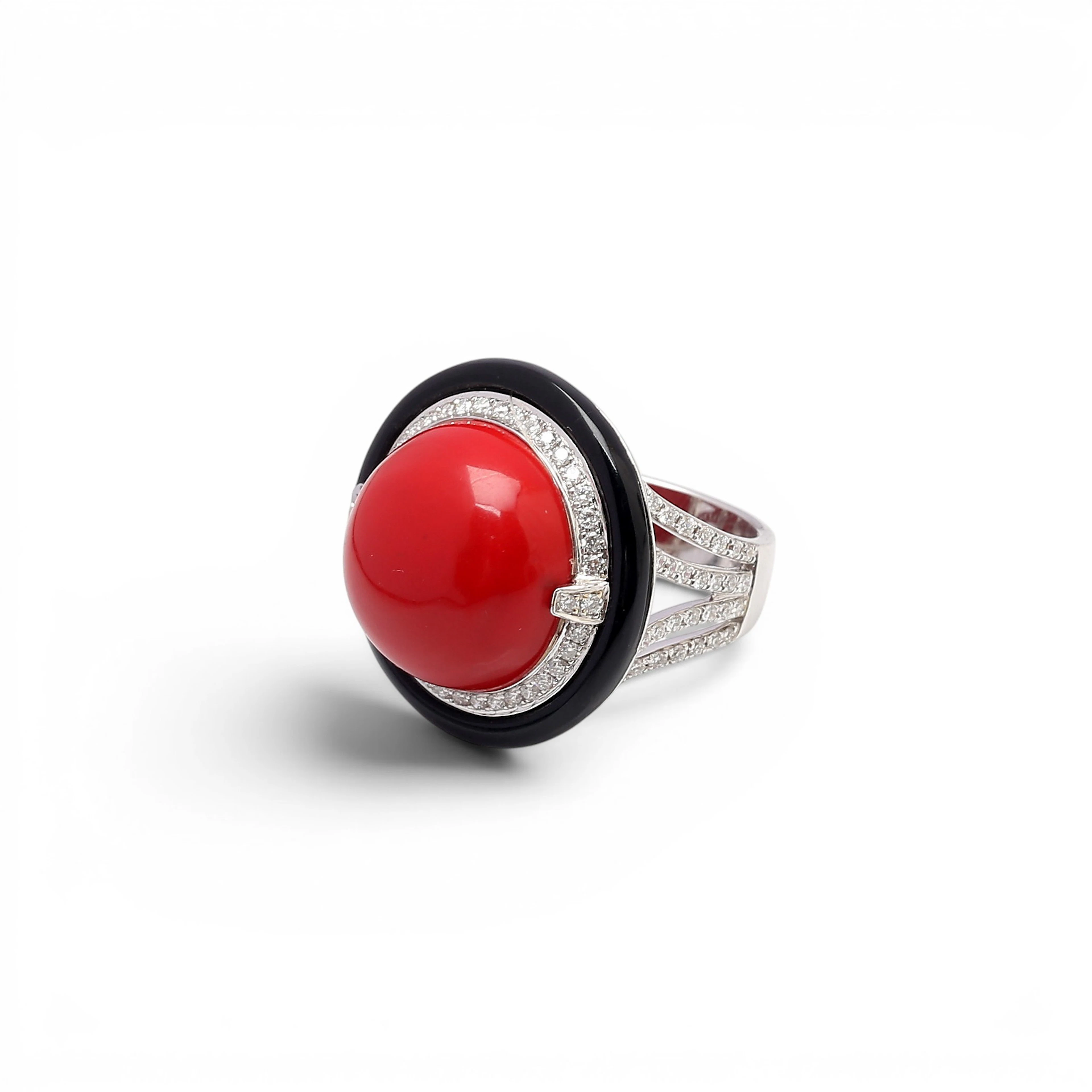 Coral, onyx and diamonds rosette ring.