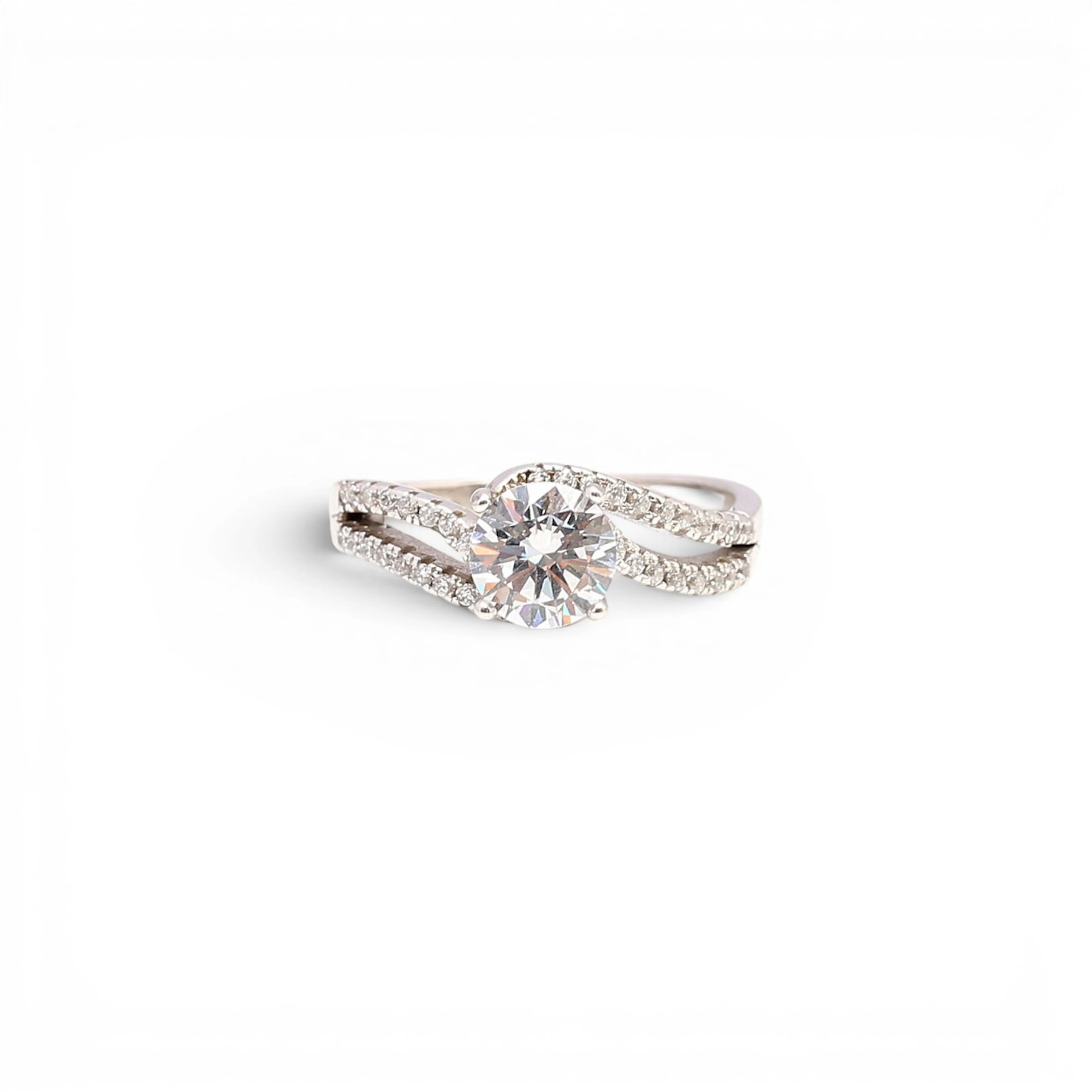 Zircons solitaire ring.