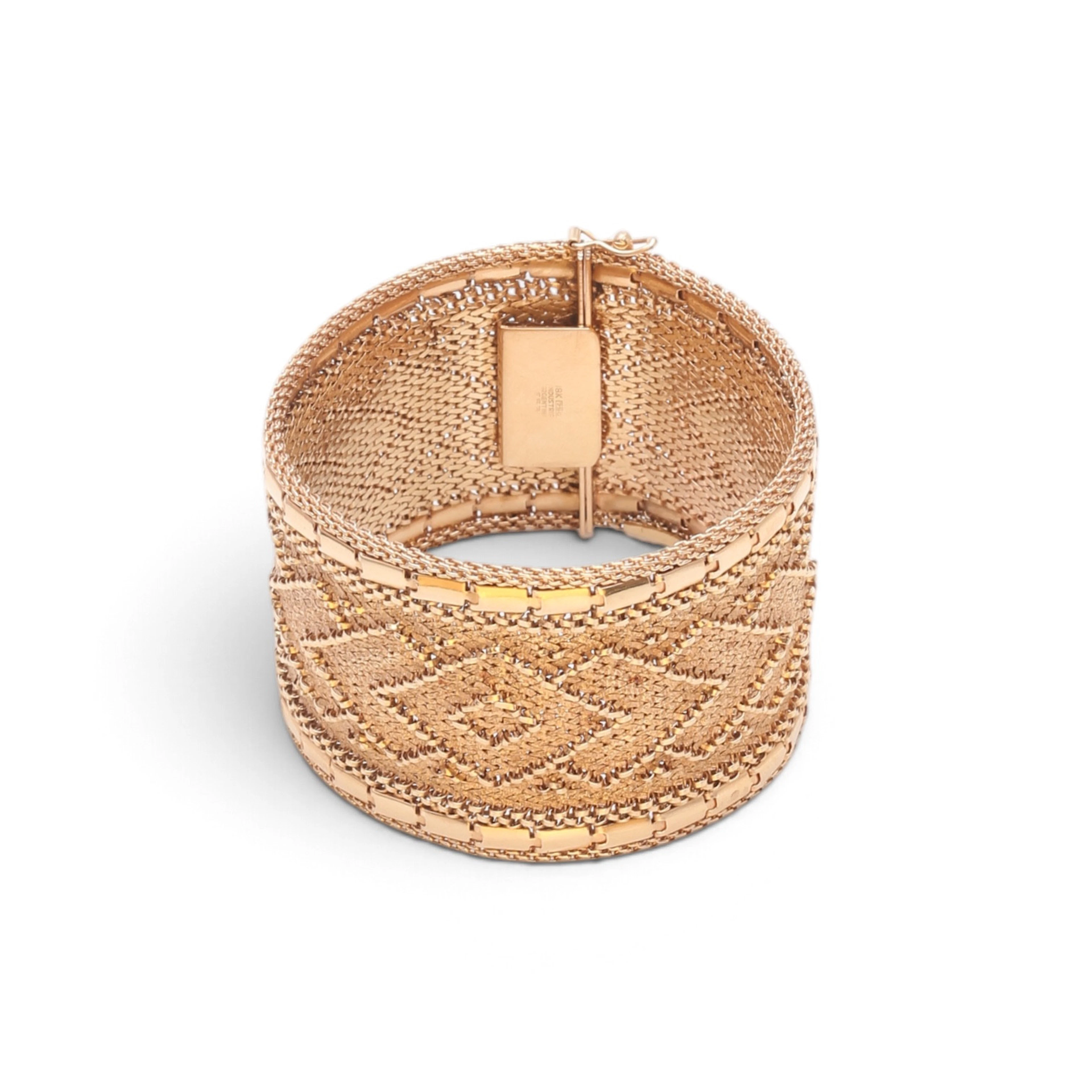 Gold mesh wide bracelet, circa 1960.