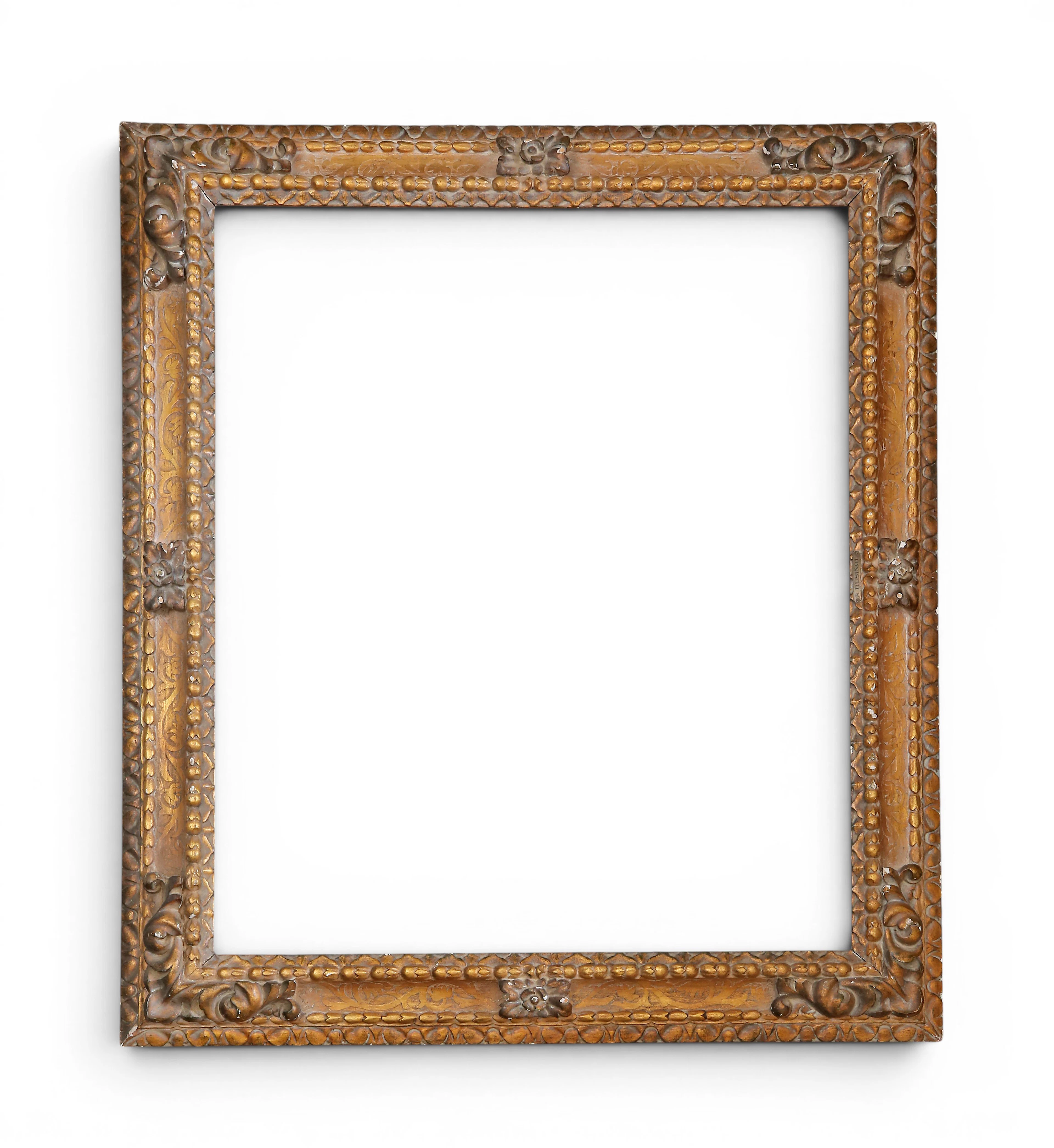 Barqoue style frame in carved, painted and gilt wood, early decades