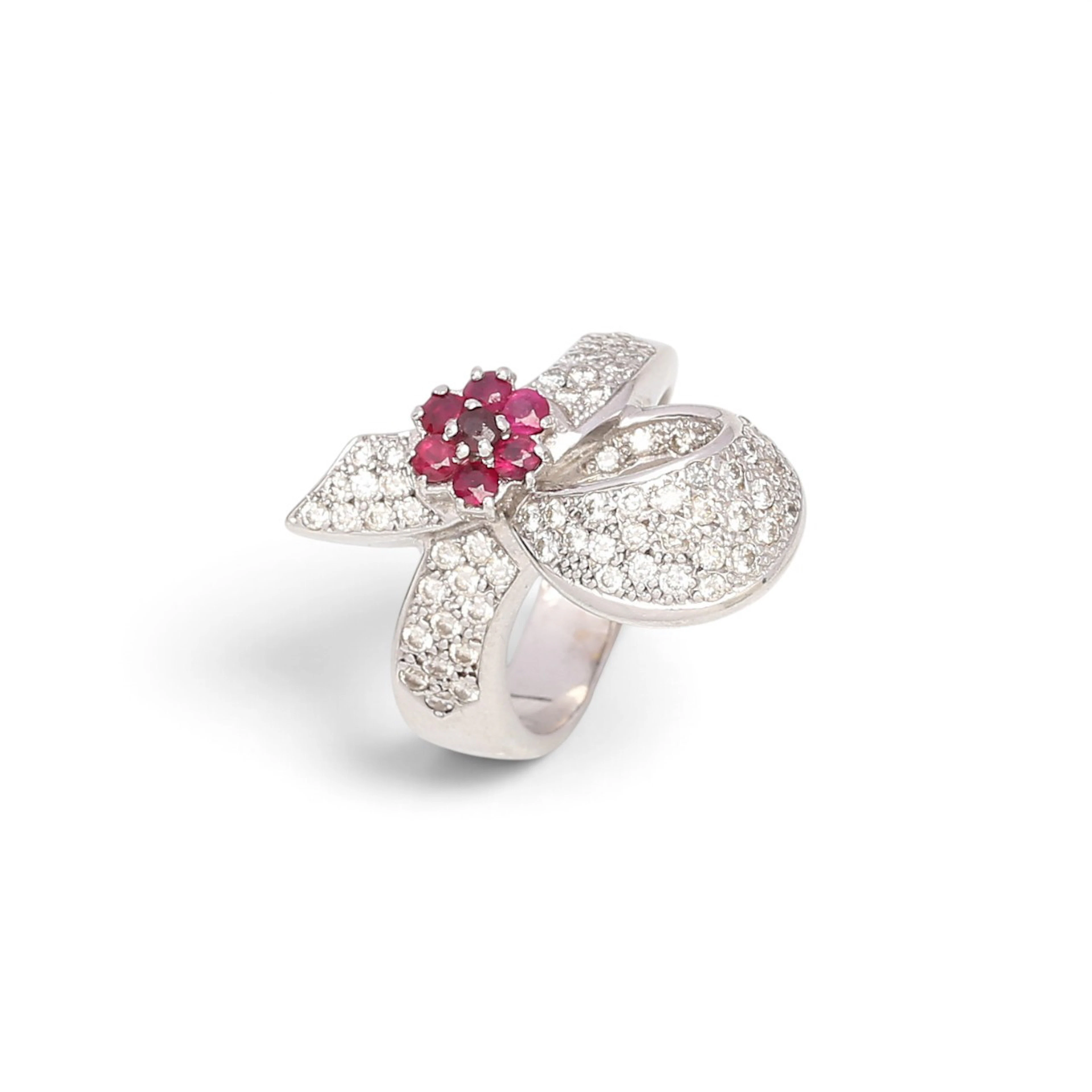 Bow-shaped diamonds and rubies ring.