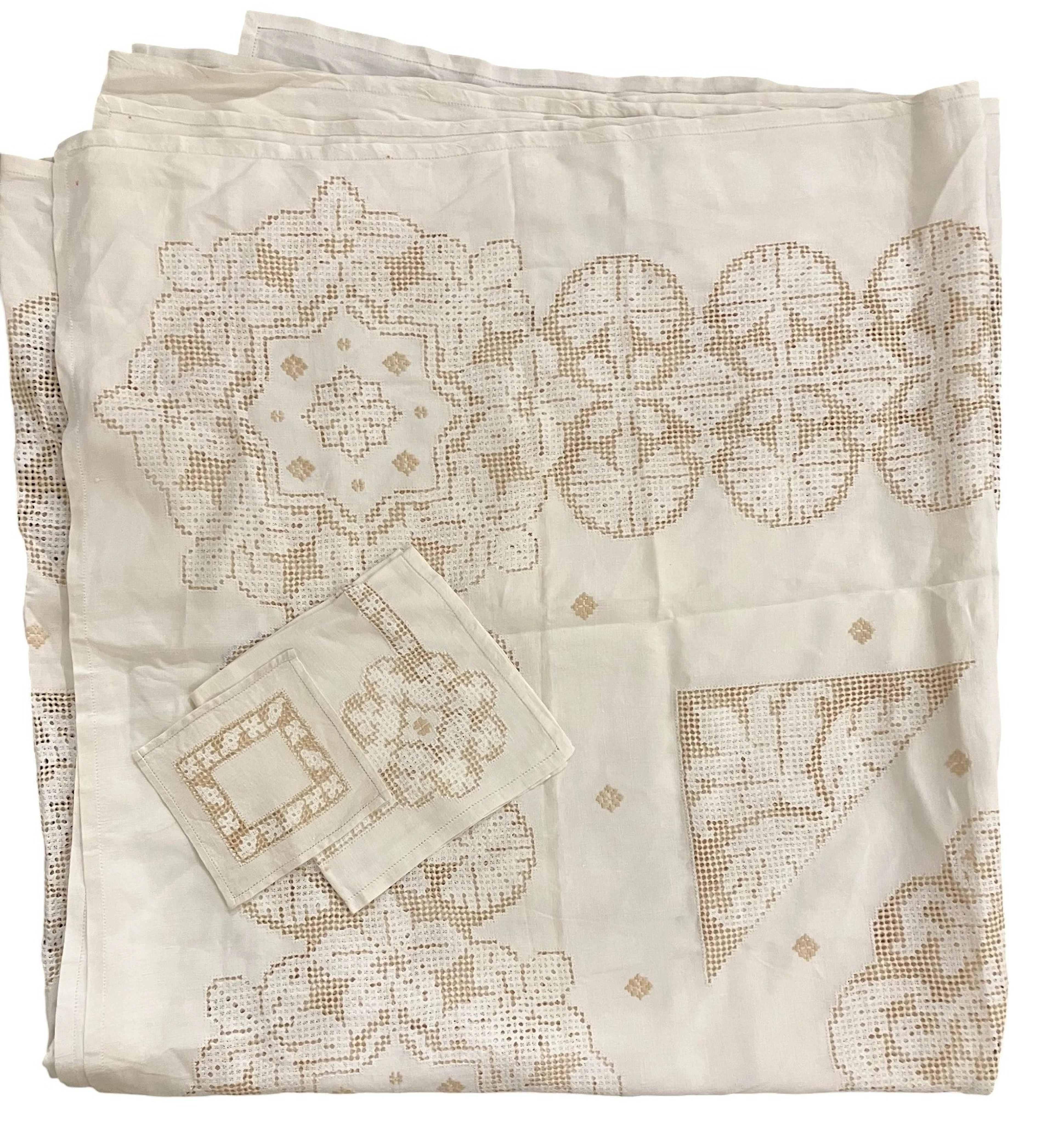 Set of thread table linen with hemstitched borders and ochre accents