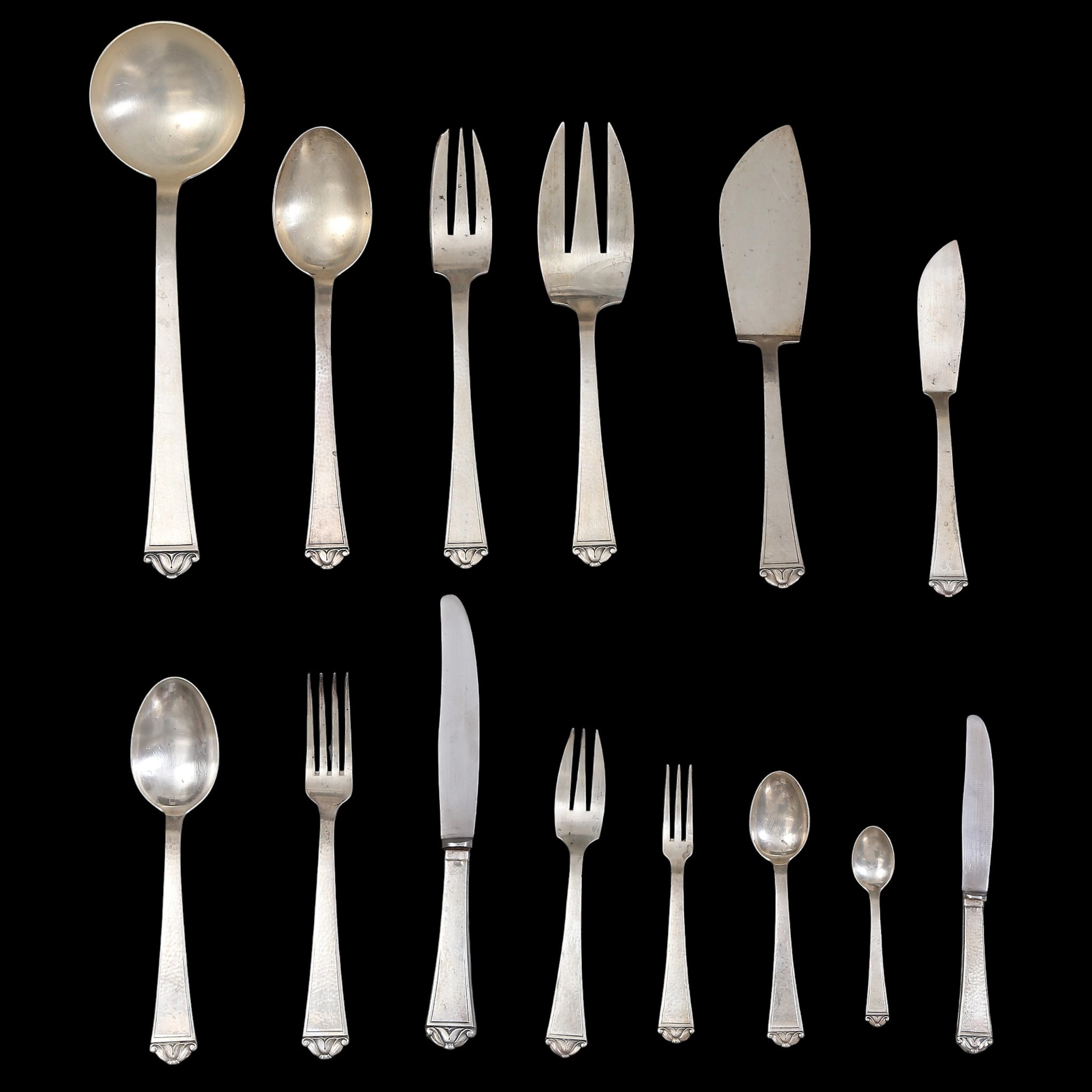 20th-century Spanish 12-setting "martelé" silver cutlery in the Art
