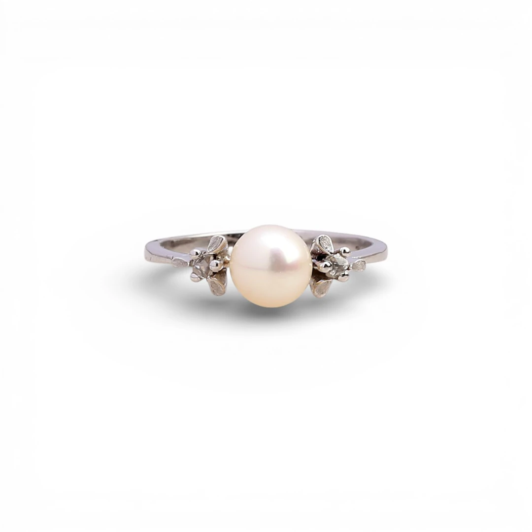 Pearl and diamond triplet ring.