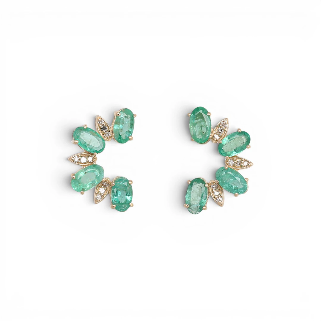 Emeralds and diamonds earrings.
