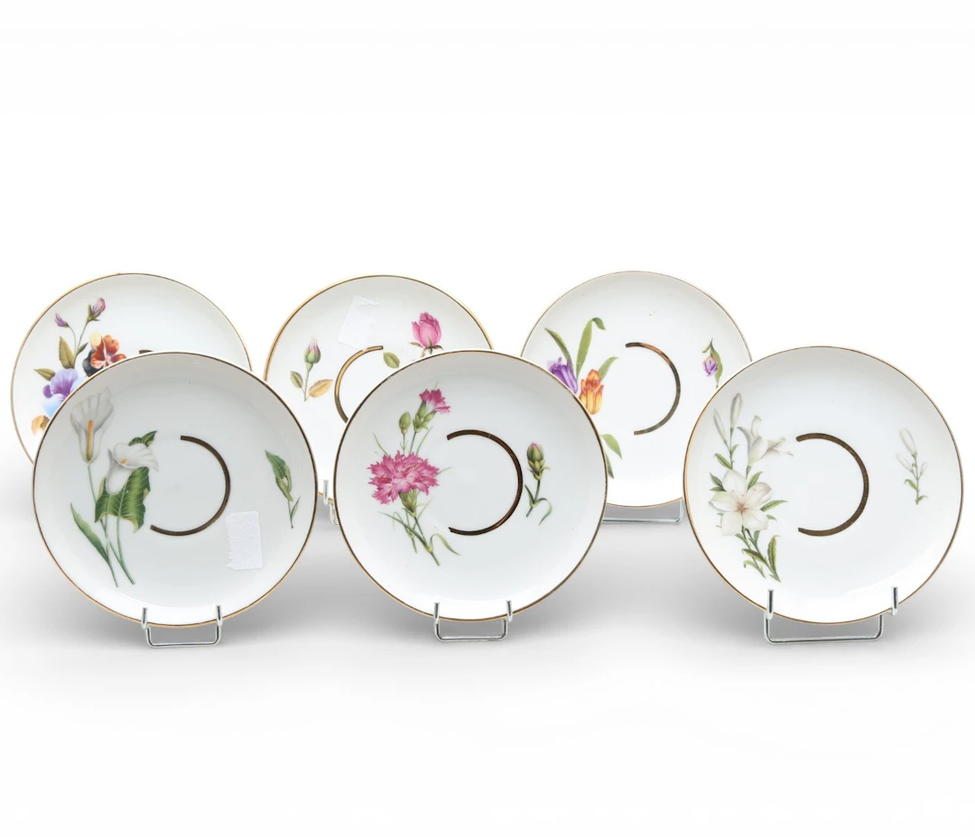Six Limoges porcelain snack dishes, 20th Century.