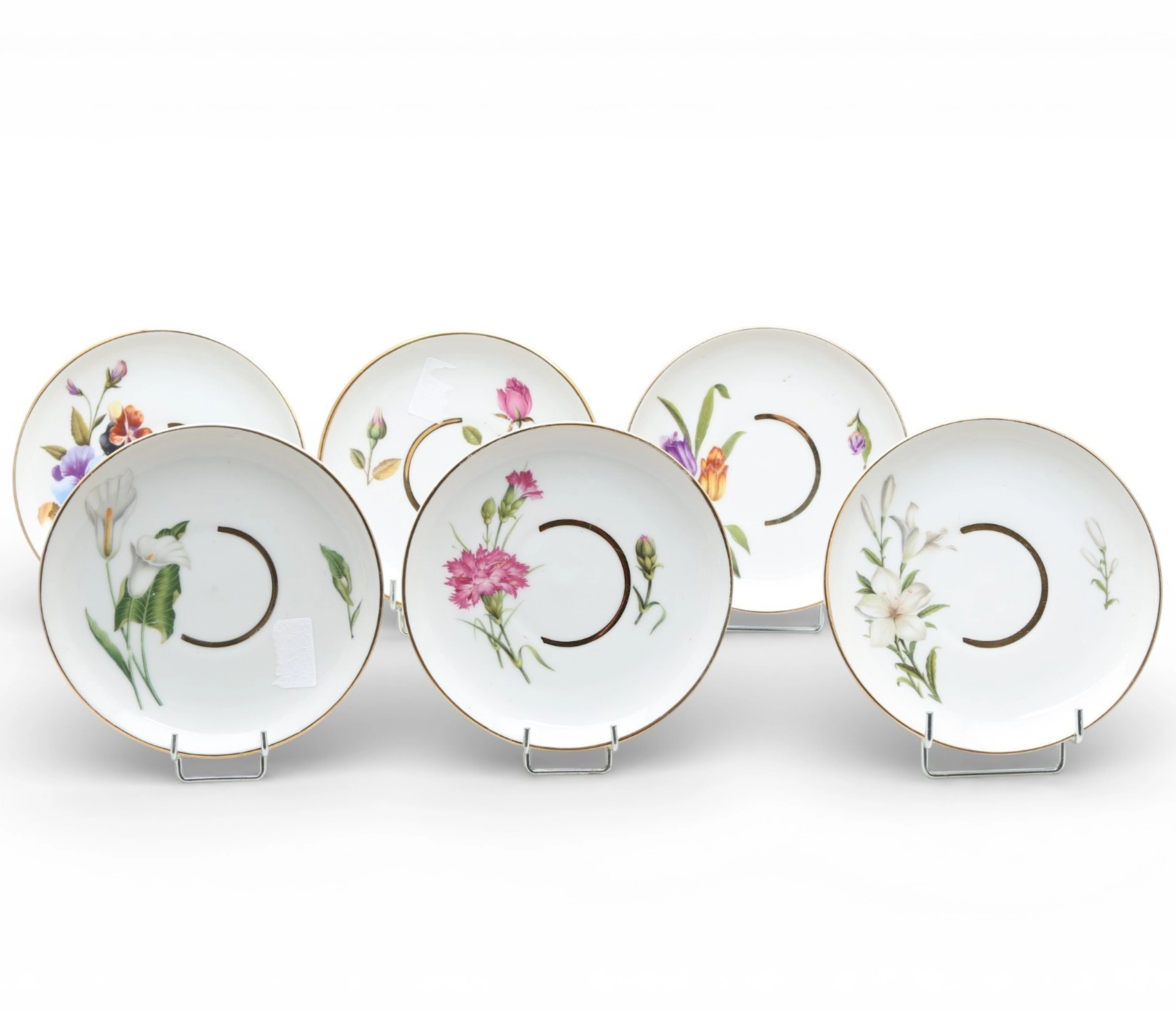 Six Limoges porcelain snack dishes, 20th Century.