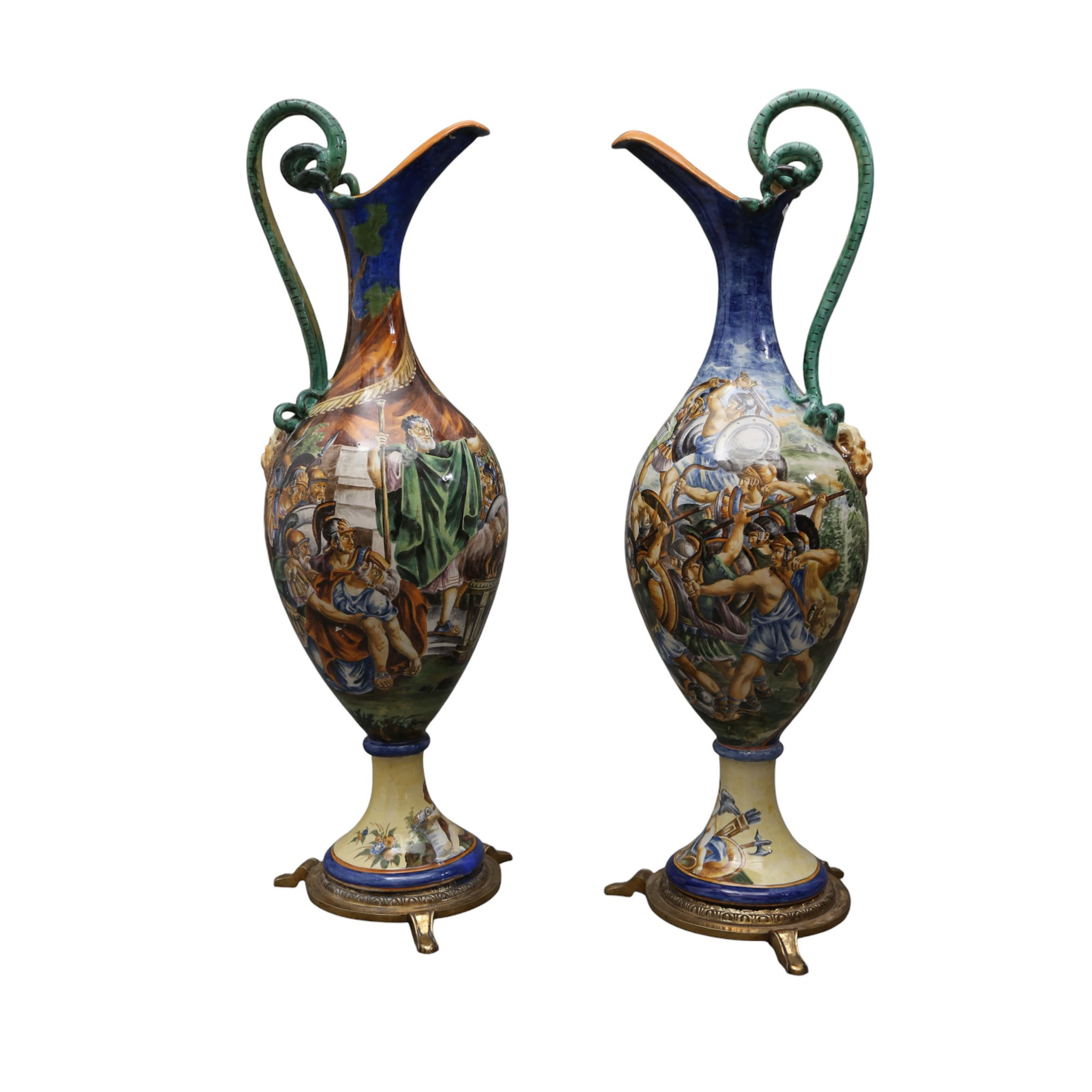Pair of Renaissance-style Italian ewers in earthenware, from the 19th century.