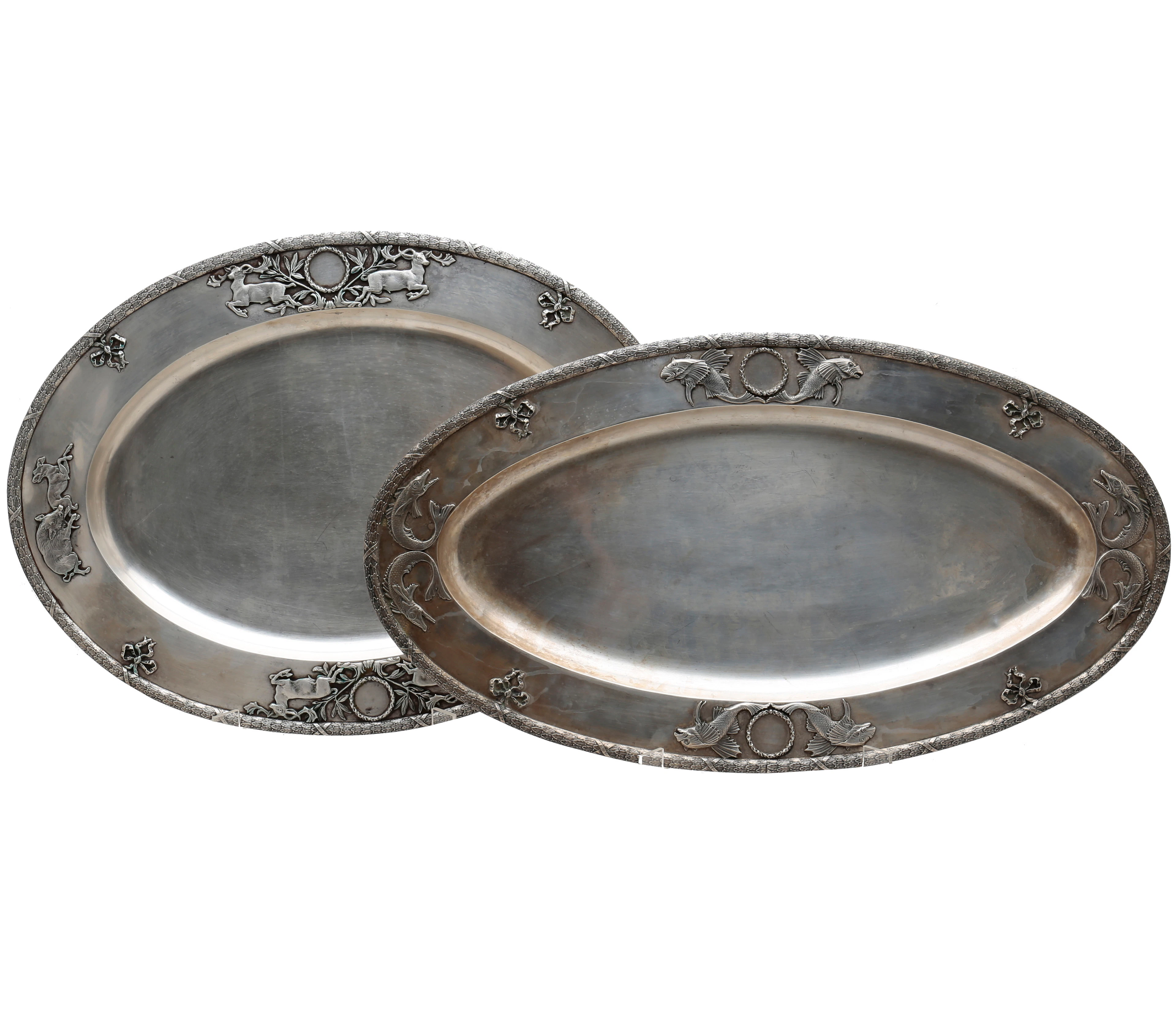 Two silver trays by Masriera and Carreras.