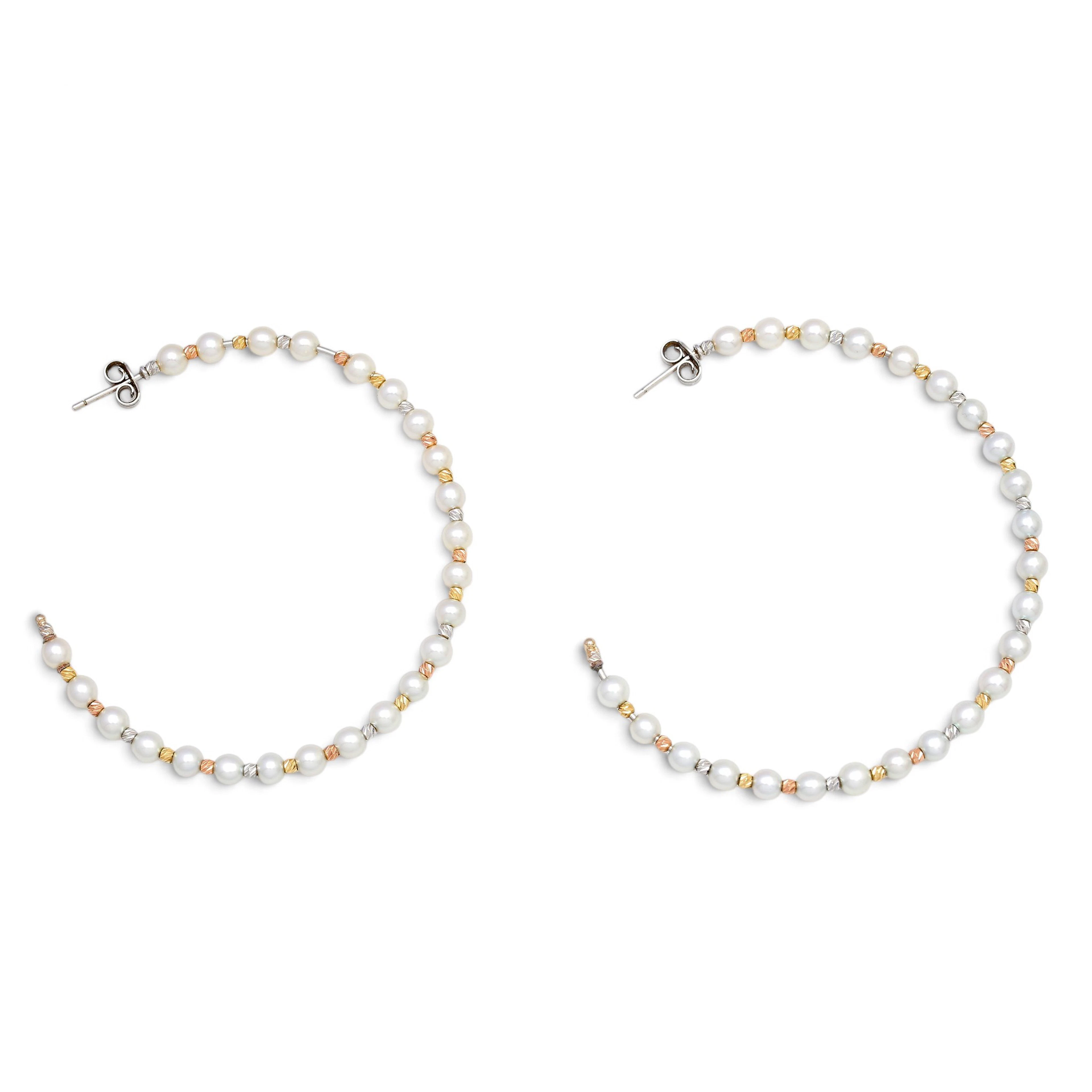 Gold and pearls creole earrings.