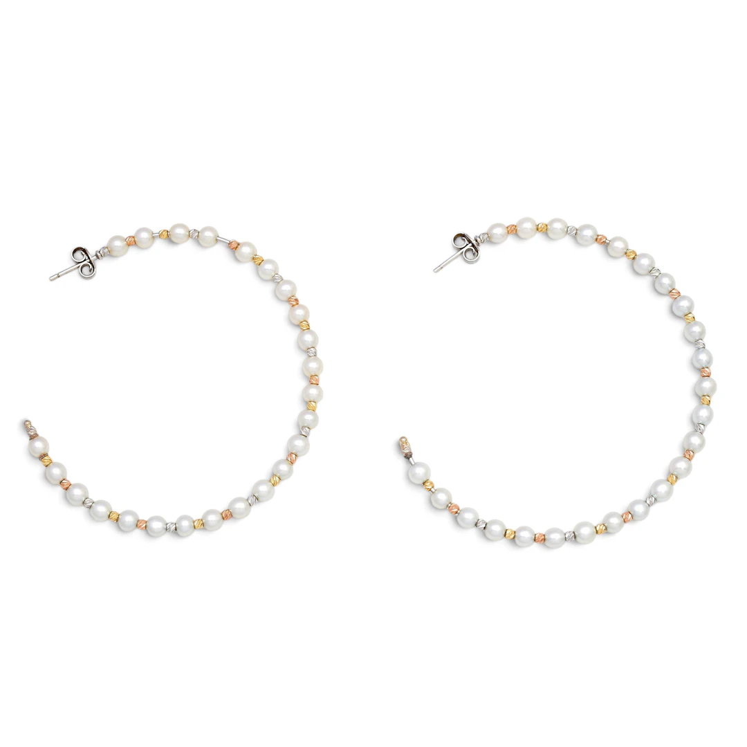 Gold and pearls creole earrings.
