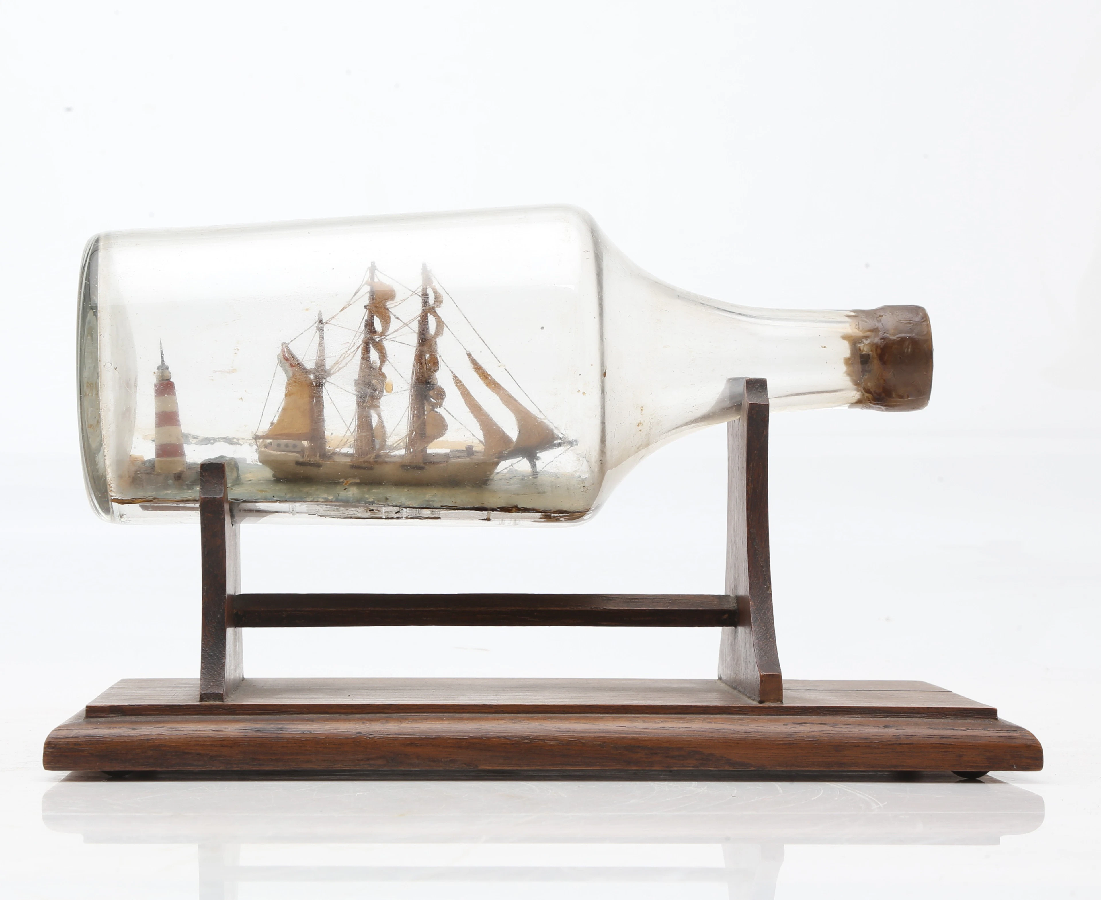 Catalan blown glass bottle with miniature ship, early 19th century.