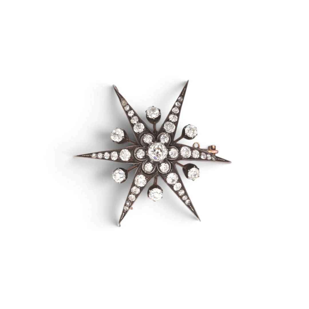 STAR-SHAPED brooch-pendant, late 19th century.