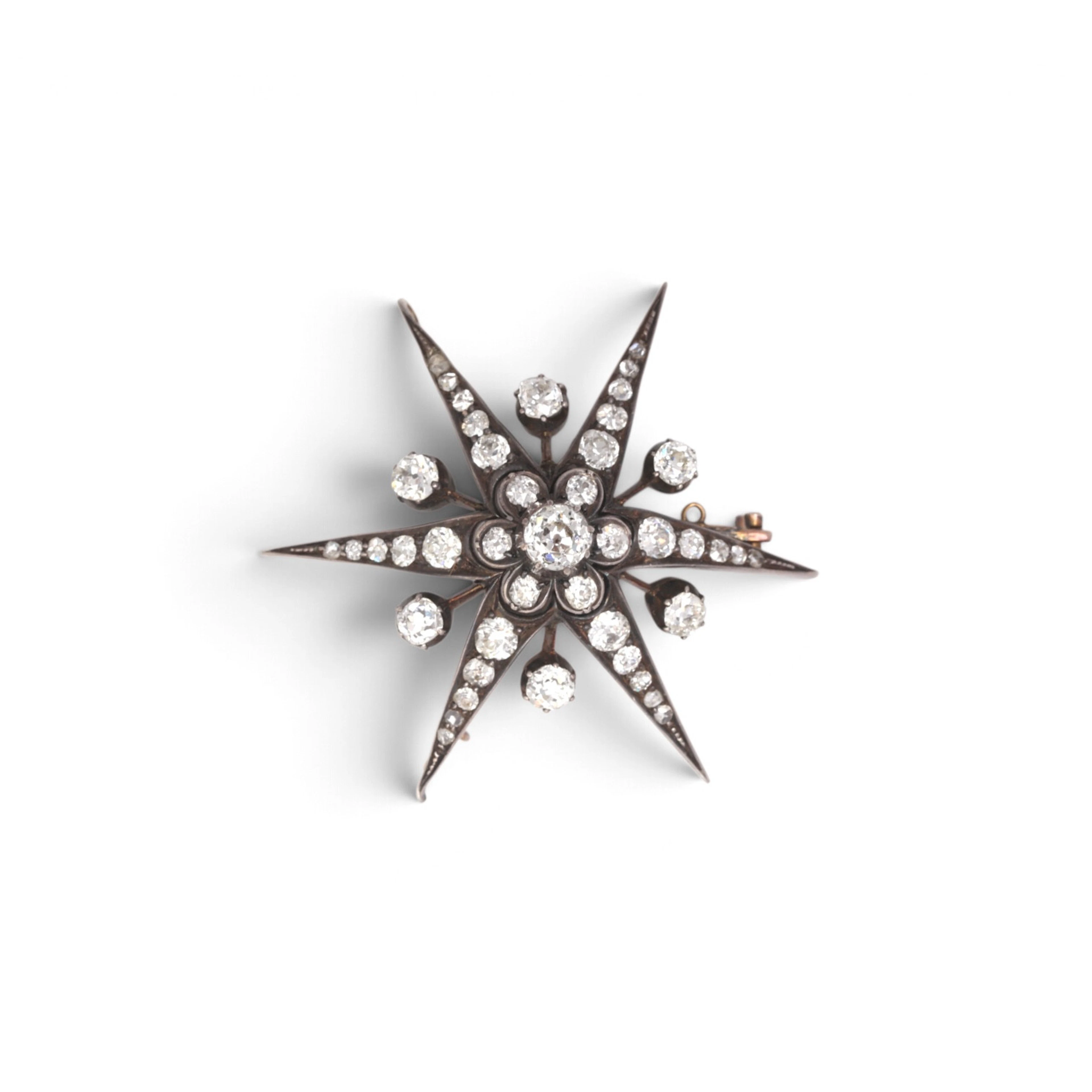 STAR-SHAPED brooch-pendant, late 19th century.