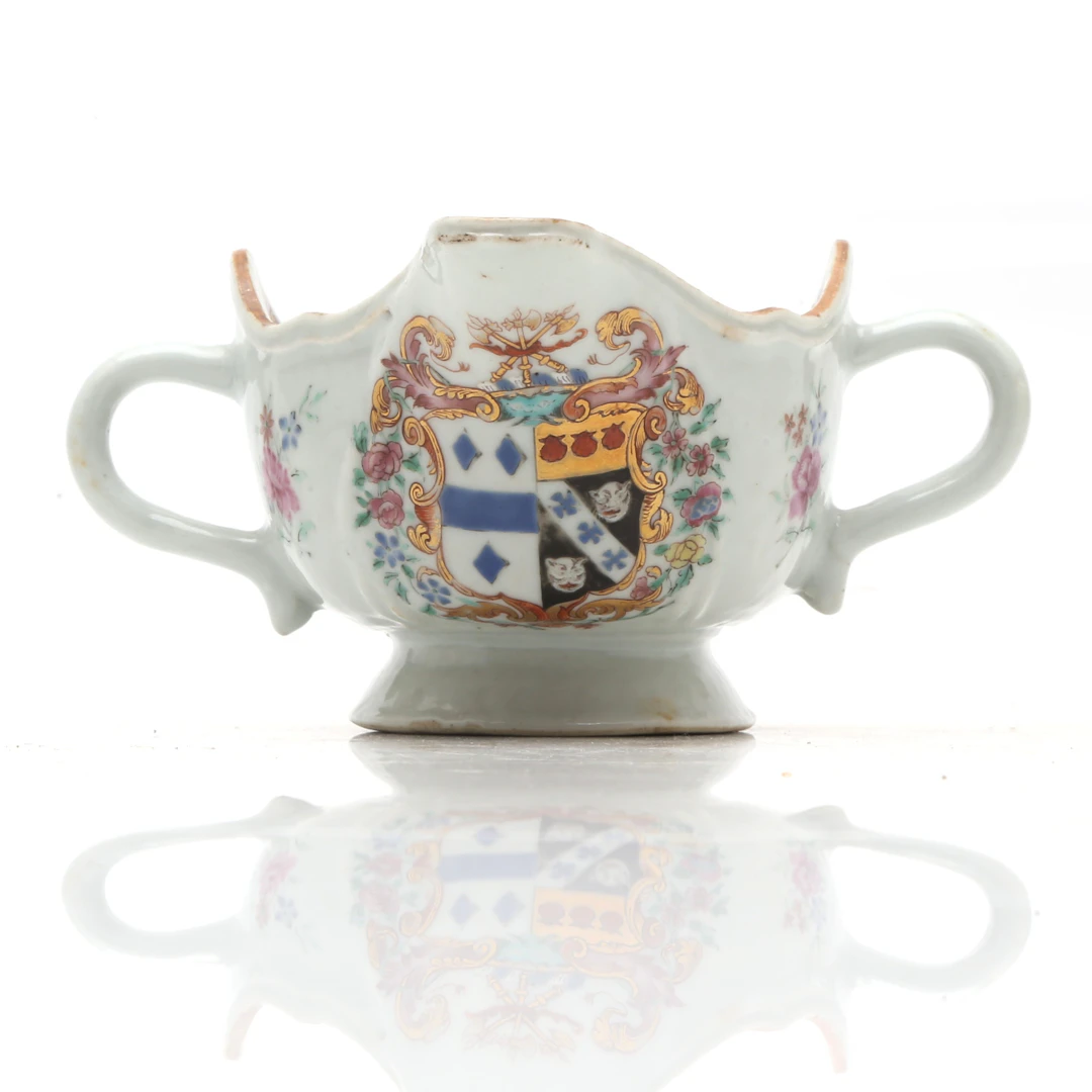 CHINESE Qianlong armorial sauceboat in famille rose porcelain, East