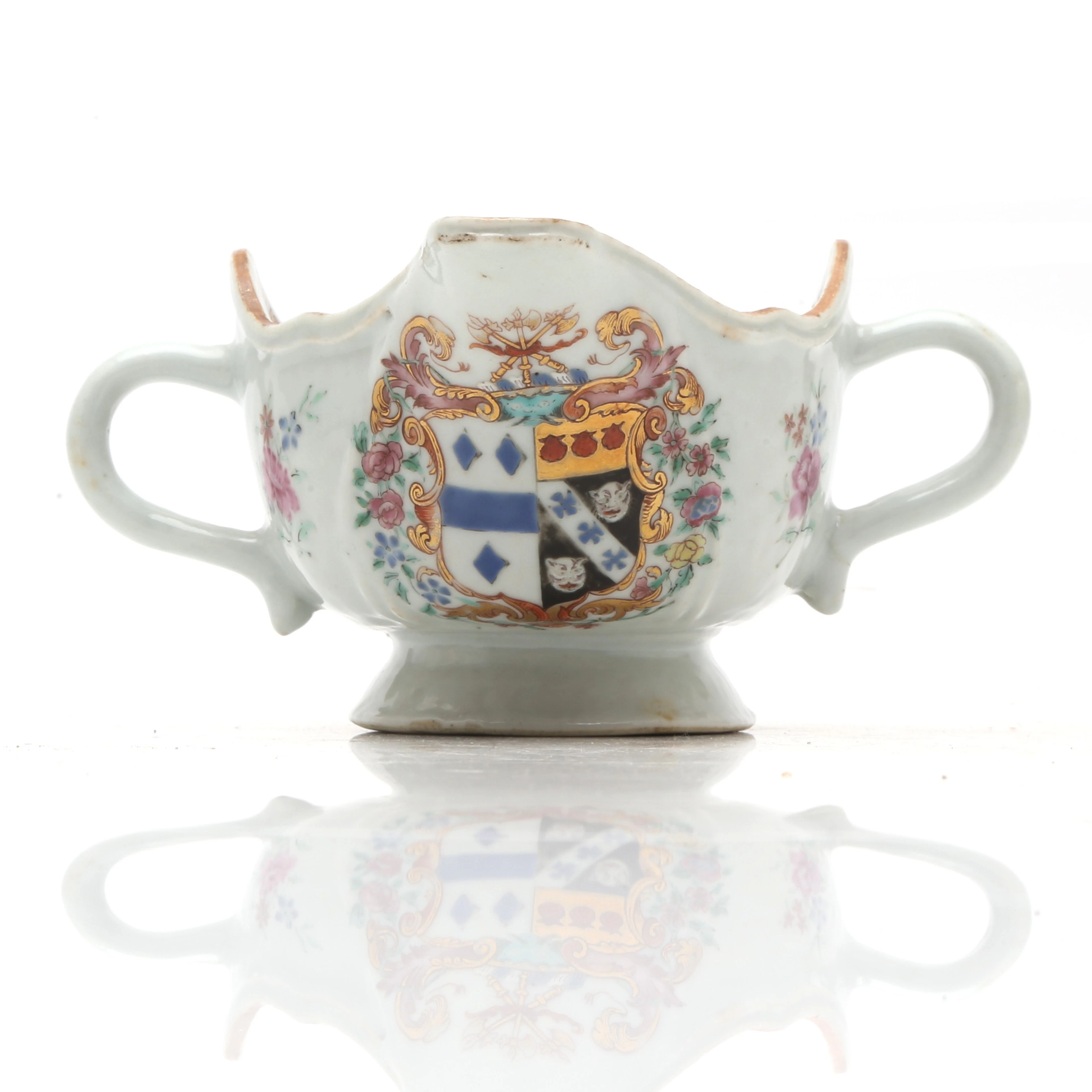 CHINESE Qianlong armorial sauceboat in famille rose porcelain, East