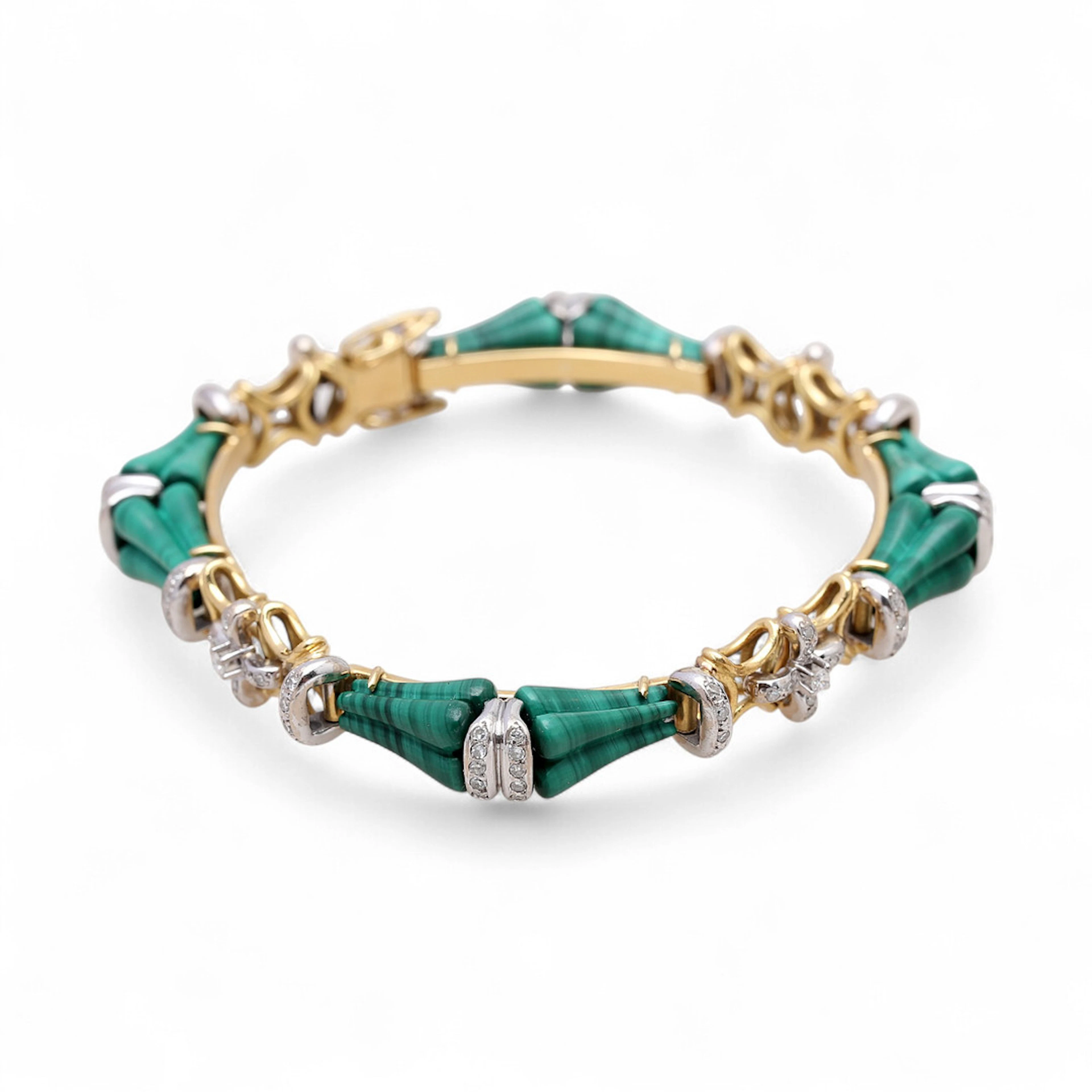 Pulsera articulada de diamantes y malaquita.
