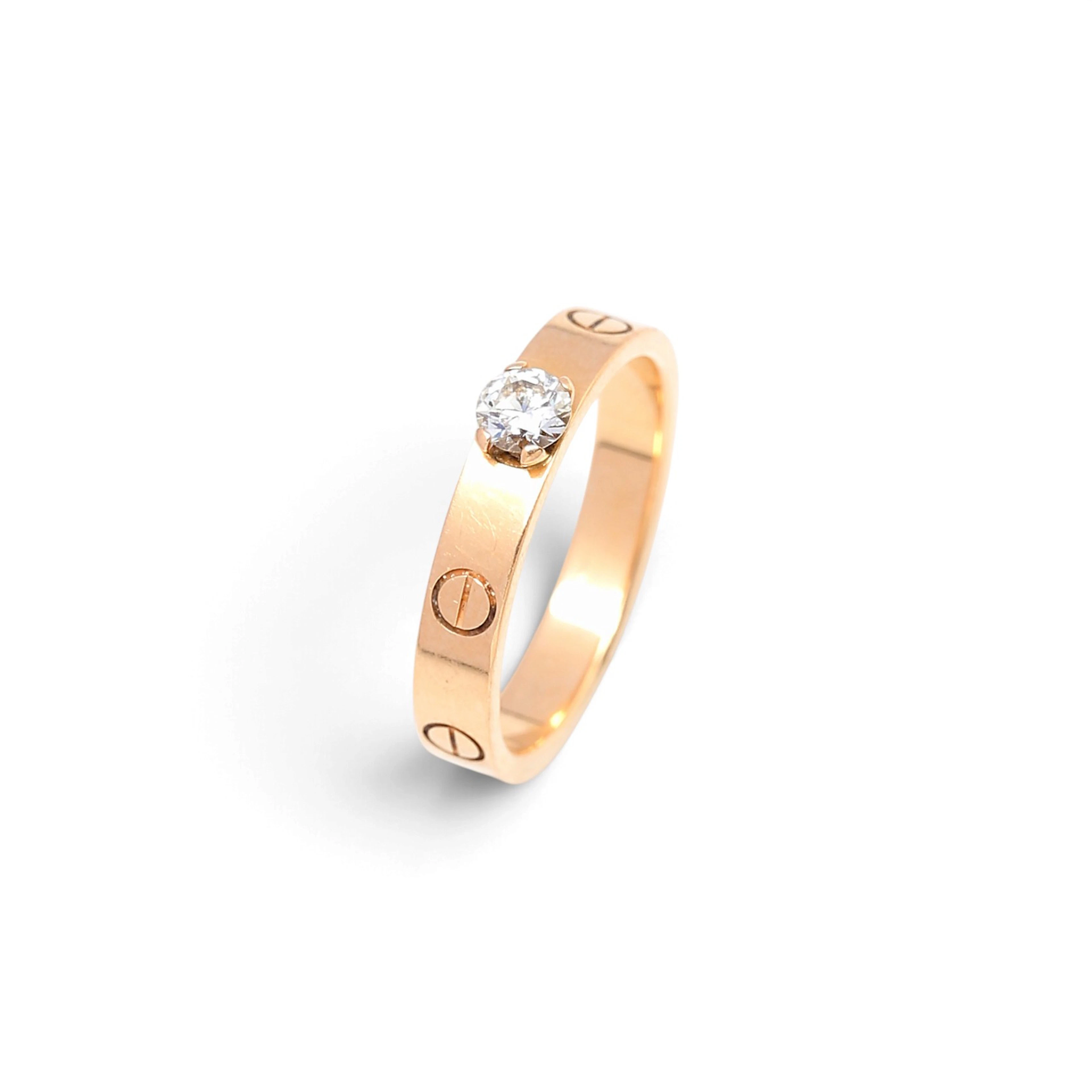 CARTIER. 'Love' ring in rose gold.